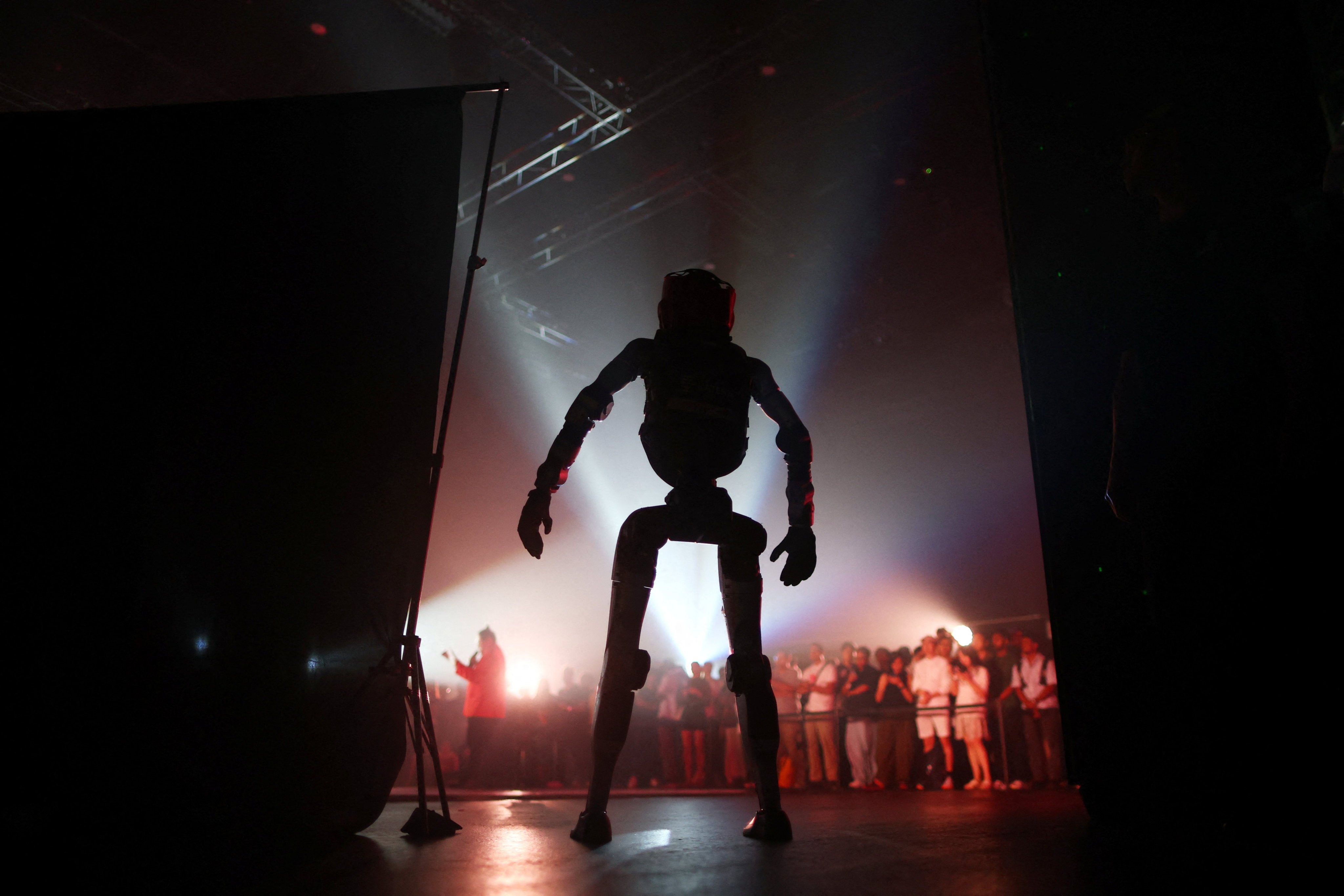 A Unitree G1 robot enters the ring at a humanoid combat competition in Singapore on October 7. Photo: Reuters