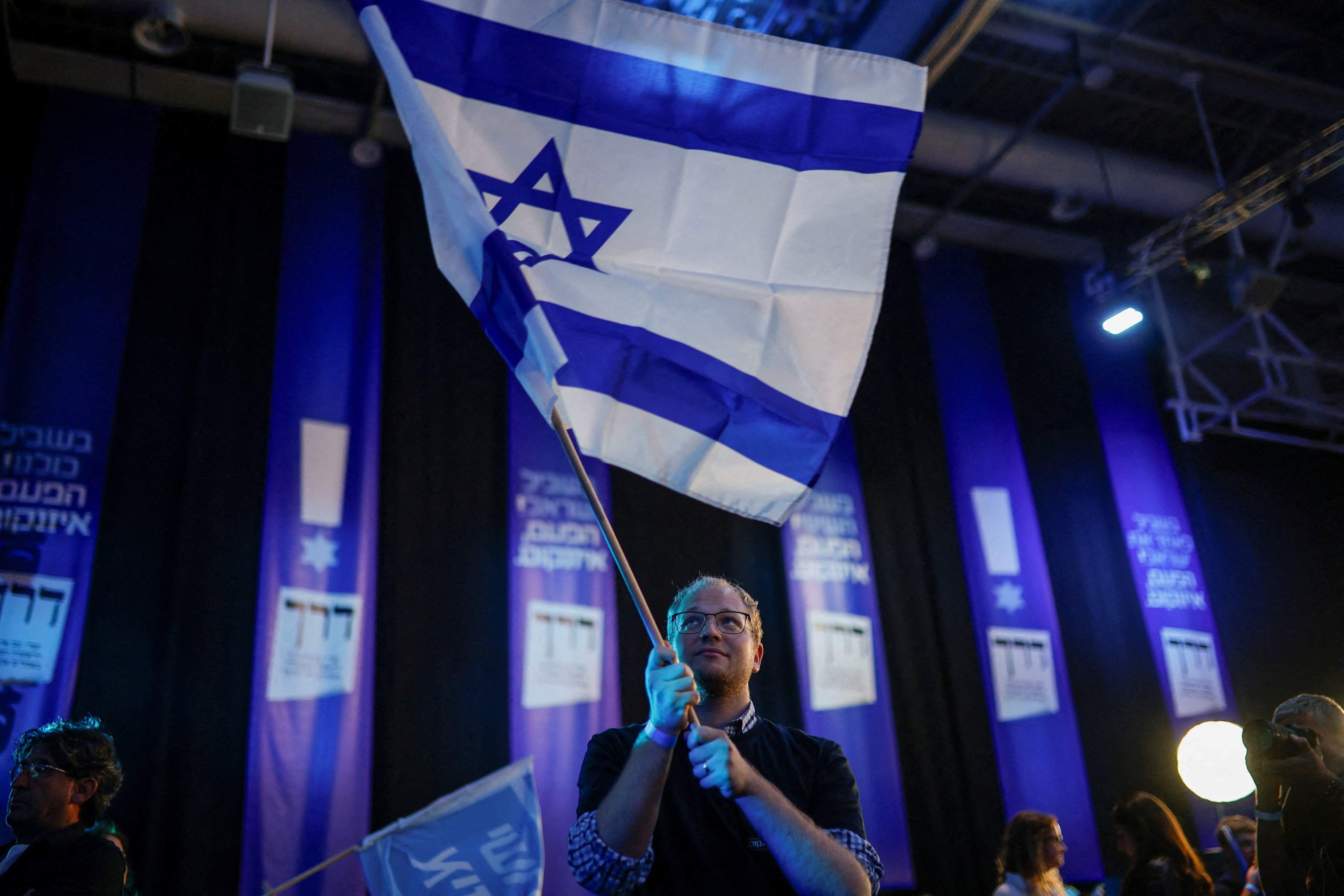 A supporter of opposition leader Gadi Eisenkot in Tel Aviv on election day. Photo: Reuters