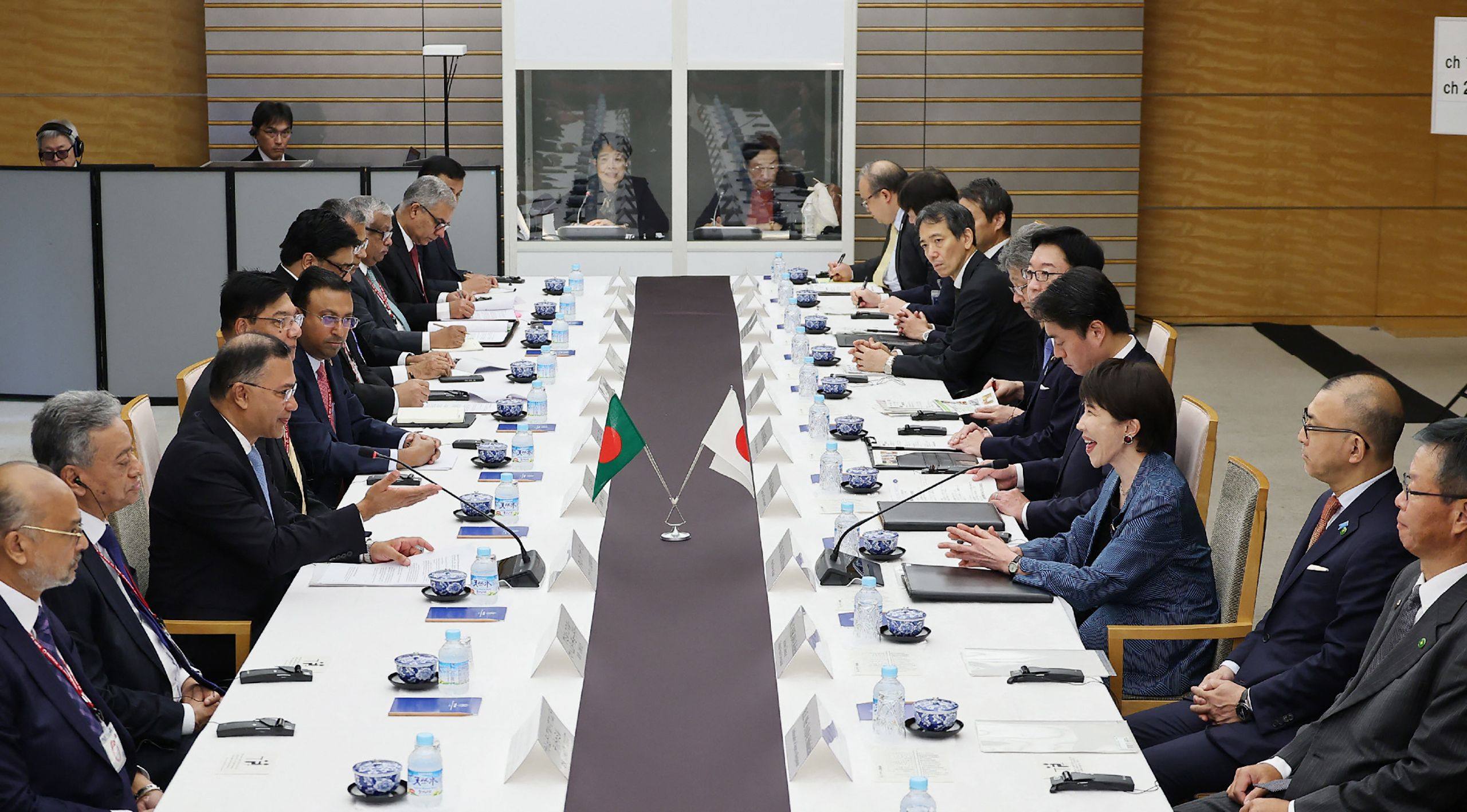 Japanese Prime Minister Sanae Takaichi (third from right) and Bangladeshi Prime Minister Tarique Rahman (third from left) lead talks at the Prime Minister’s Office in Tokyo on Tuesday. Photo: AFP