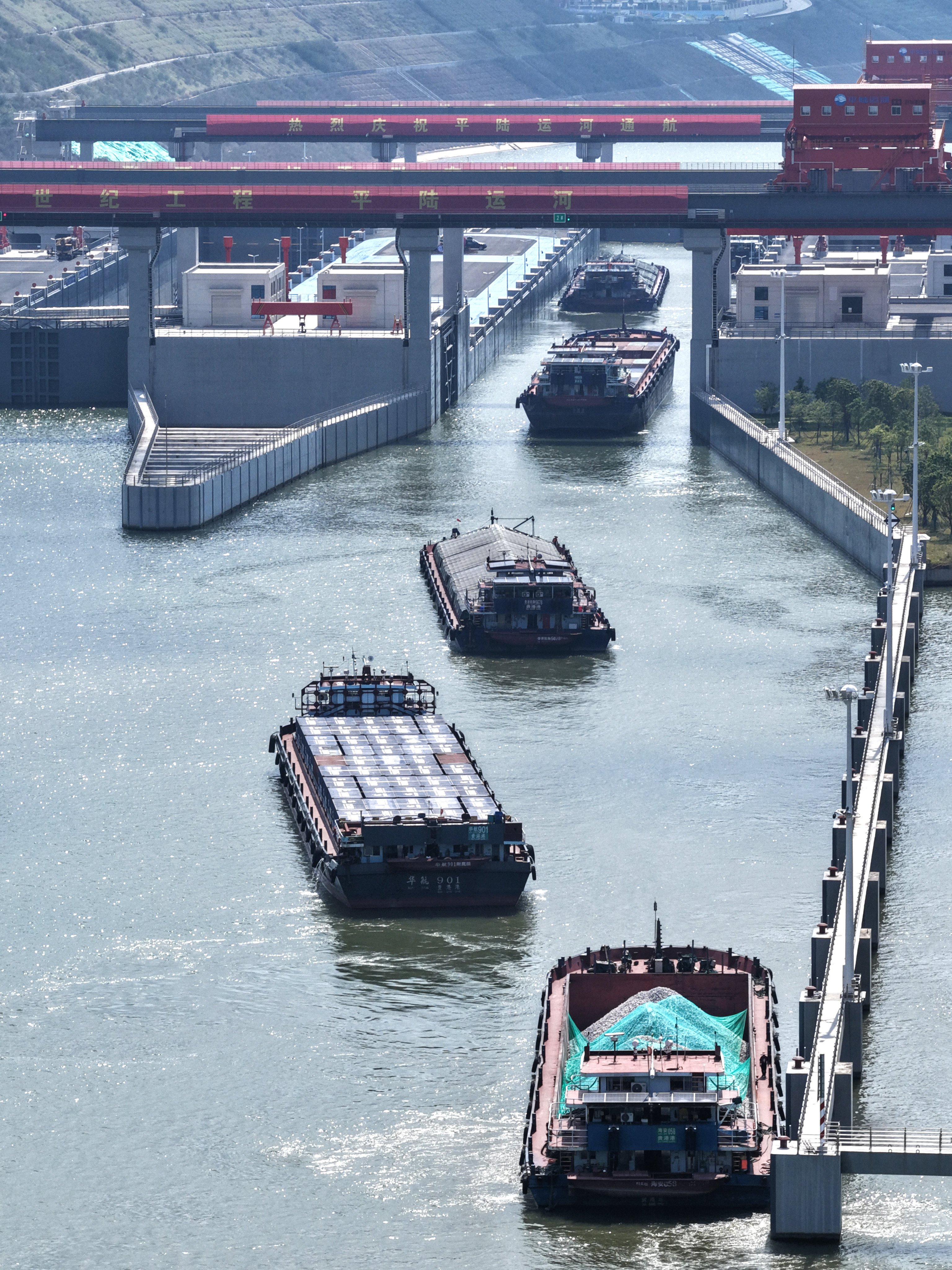 Cargo vessels pass through the Madao hub on the Pinglu Canal in south China’s Guangxi Zhuang autonomous region on October 21. Photo: Xinhua