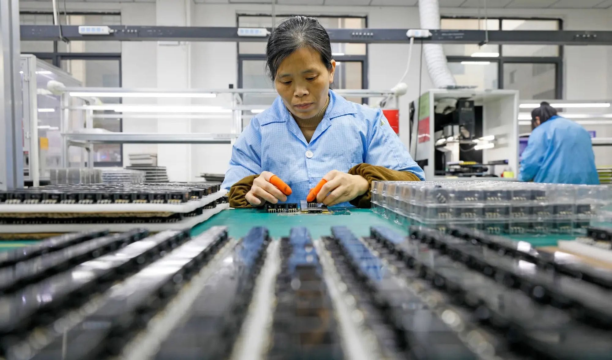 An employee works at Ji’an Xiechuang Electronic Technology in Jiangxi province, China. Photo: Reuters An employee works at Ji’an Xiechuang Electronic Technology in Jiangxi province, China. Photo: Reuters