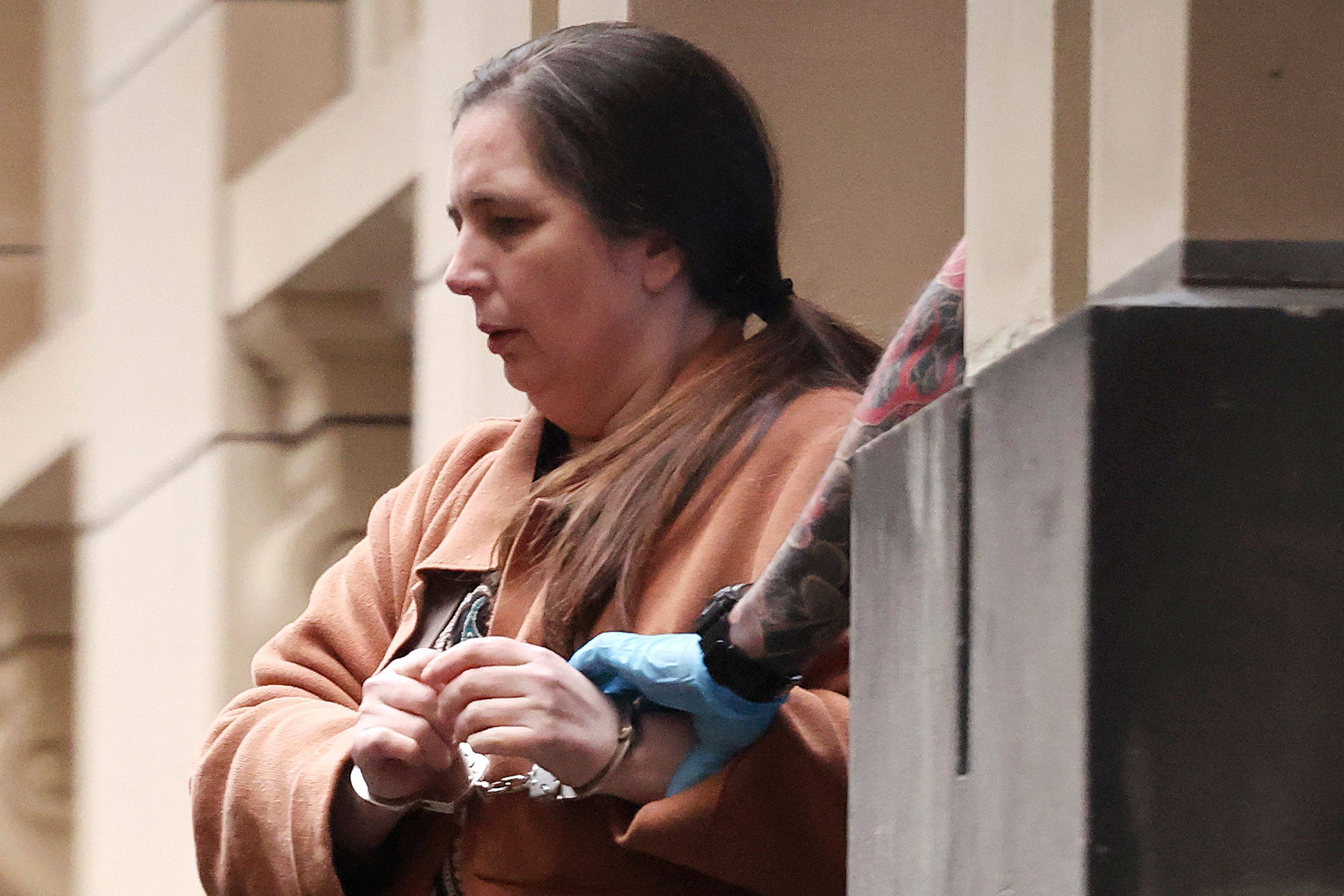 Convicted murderer Erin Patterson is escorted out of the Supreme Court of Victoria in Melbourne, Australia, last year. Photo: AFP