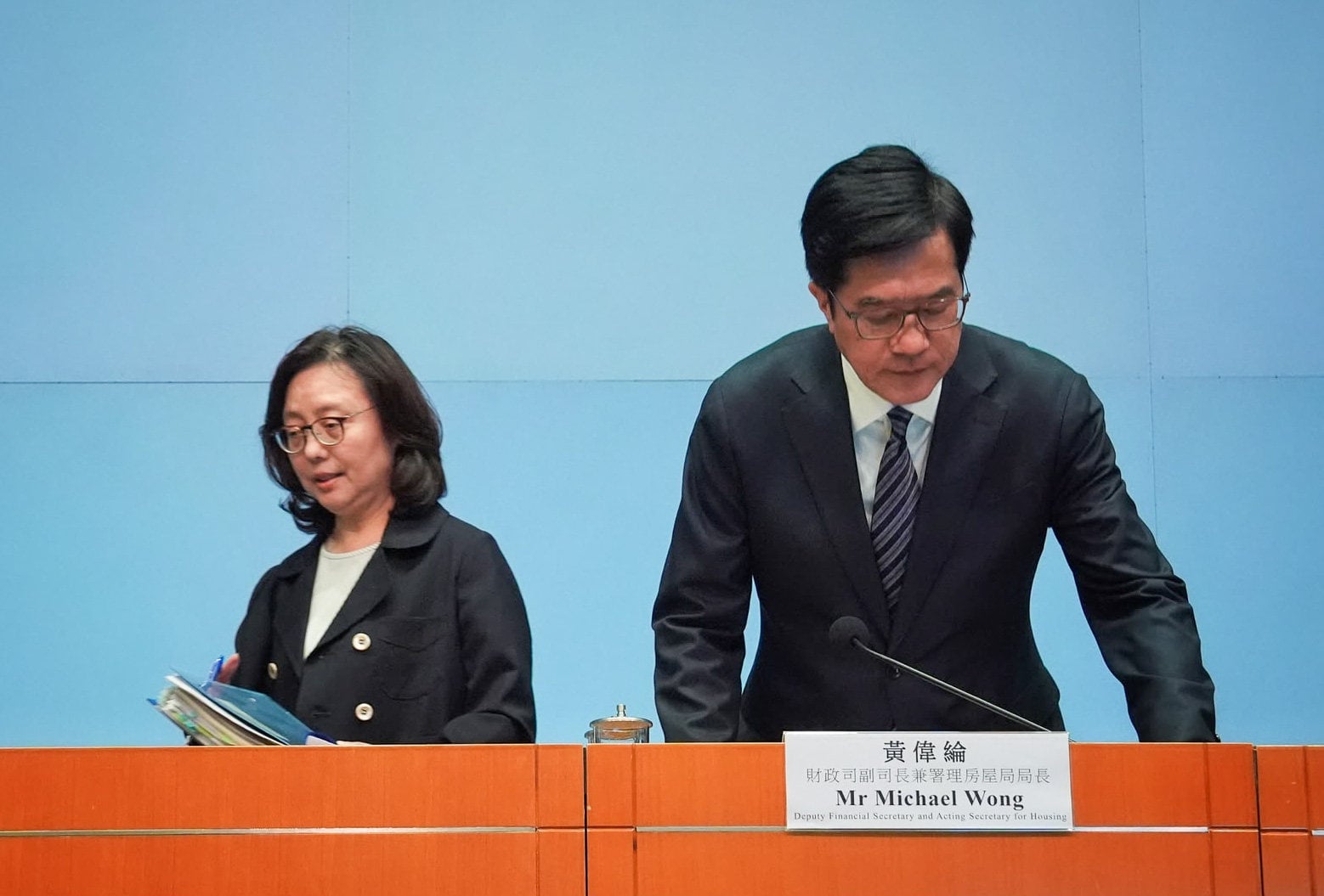 The morning press conference is led by Deputy Financial Secretary Michael Wong, who is now also acting housing minister, and development chief Bernadette Linn Hon-ho. Photo: Elson Li
