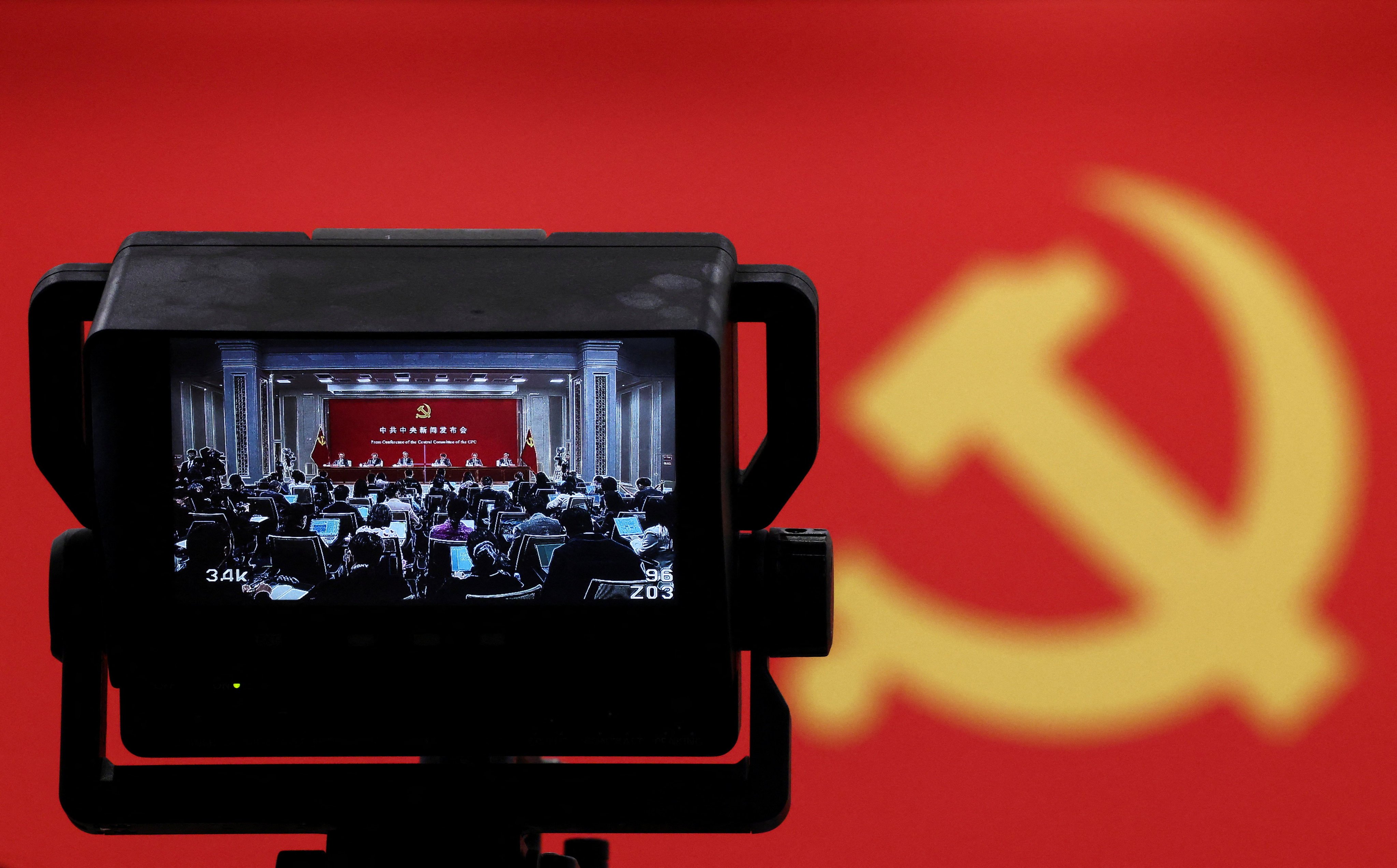 A viewfinder finds senior Communist Party officials at a press conference to explain the results of the Central Committee’s Fifth Plenum in Beijing on October 30. Photo: Reuters