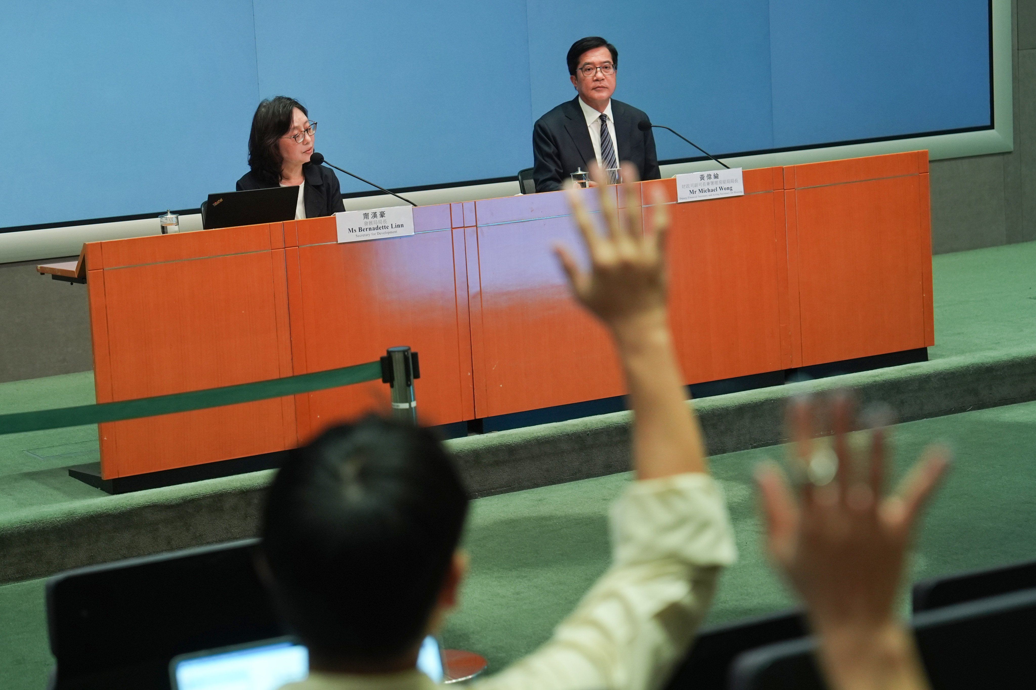 Secretary for Development Bernadette Linn (left) and Deputy Financial Secretary and Acting Secretary for Housing Michael Wong address media queries. Photo: Elson Li