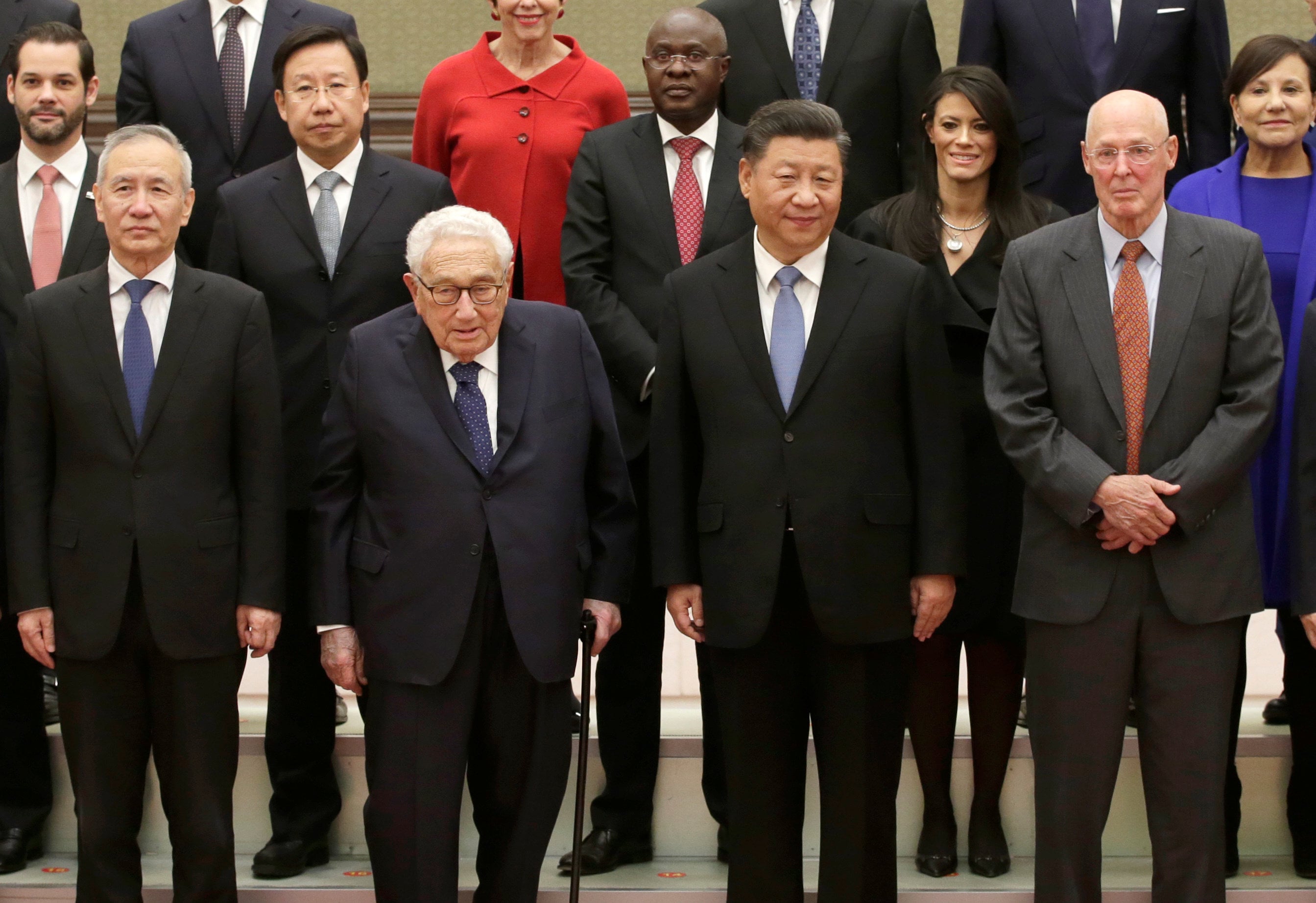 Chinese President Xi Jinping (second right) and former US secretary of state Henry Kissinger (second left) pose before a meeting at the Great Hall of the People in Beijing in November 2019. Photo: Reuters