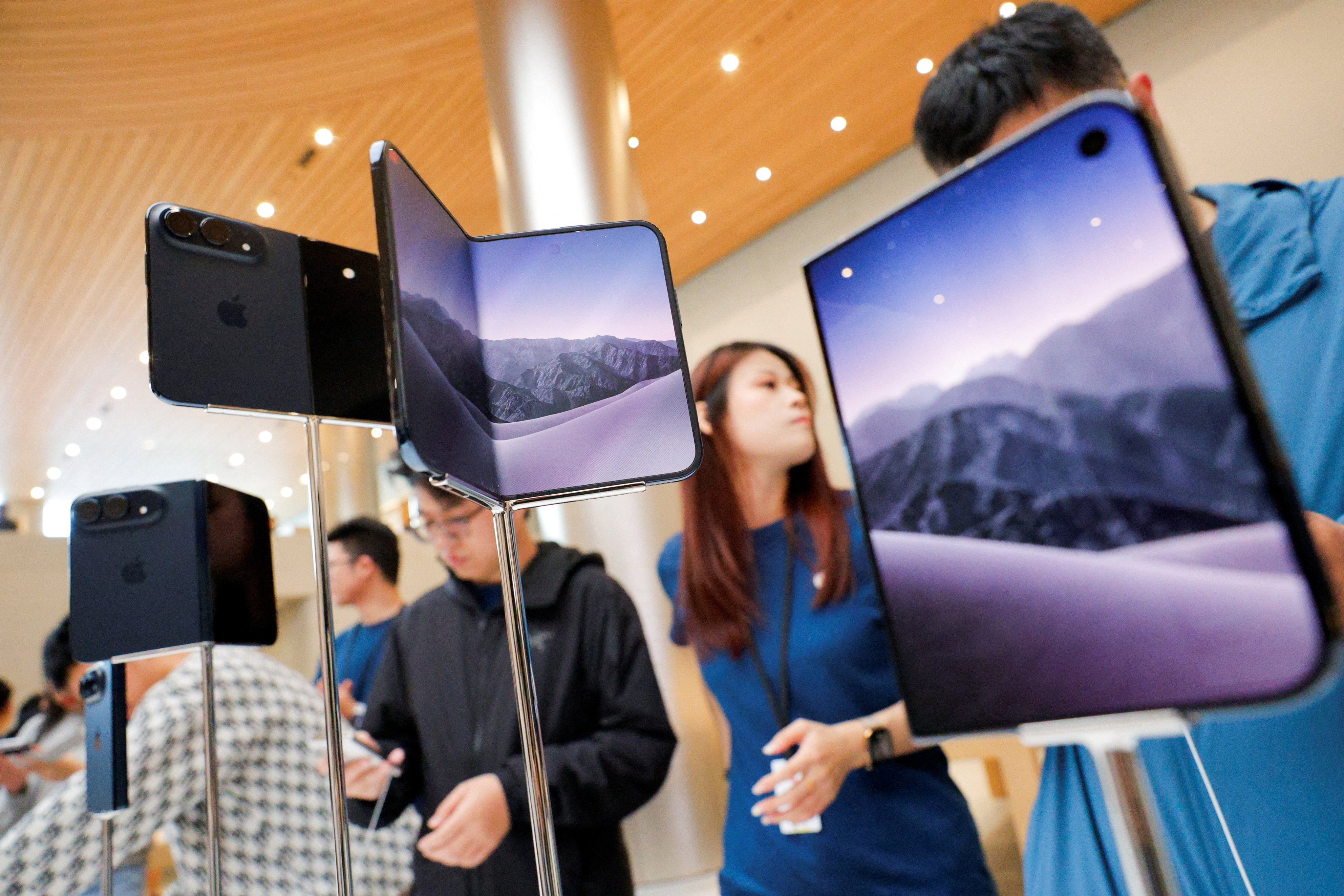 Apple’s new foldable iPhone Duo models are displayed at the Apple Jing’an Store in Shanghai on October 23. Photo: Reuters