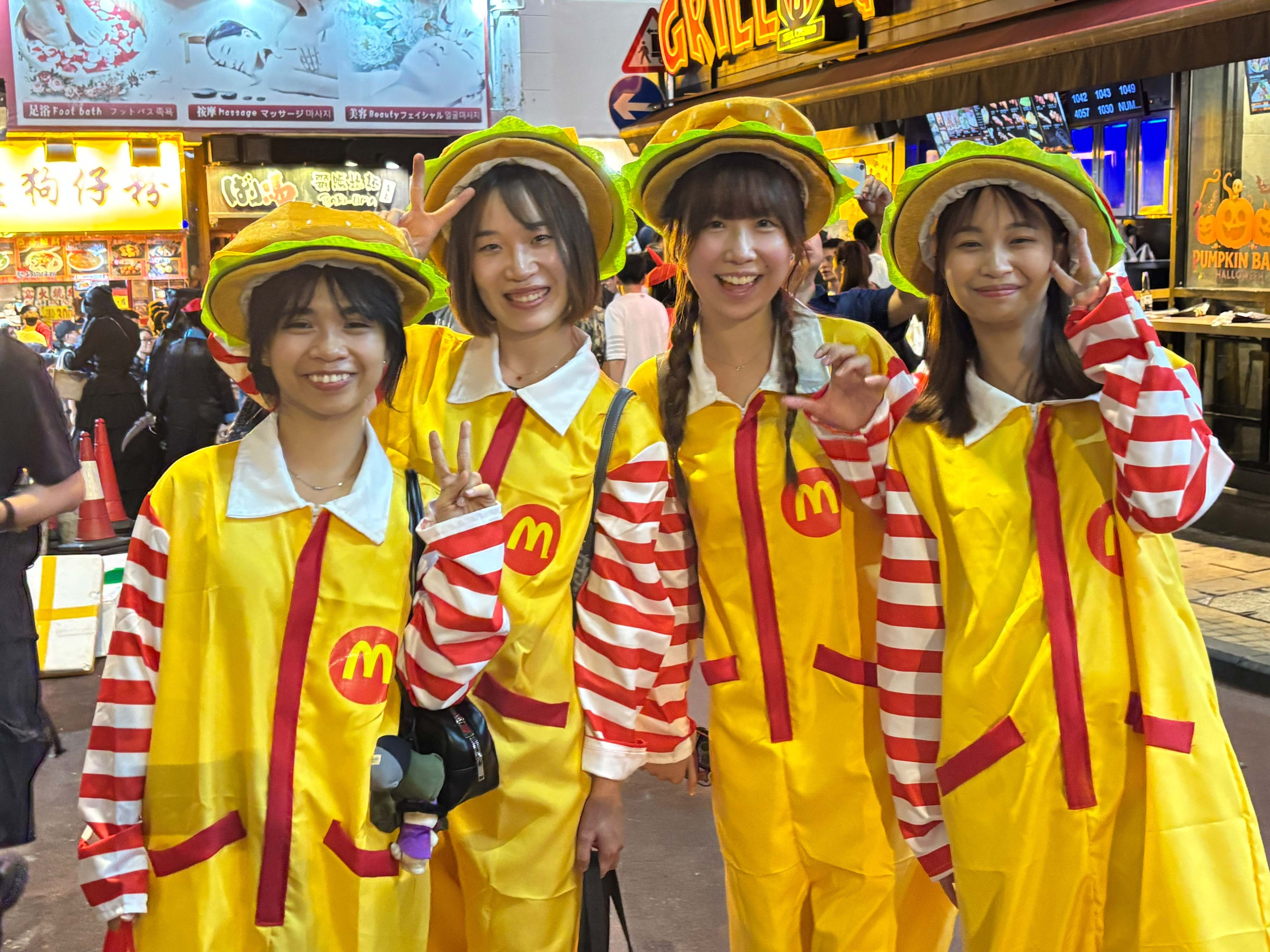 Revellers dressed in McDonald’s-themed costumes. Photo: Connor Mycroft