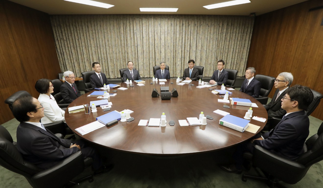 Bank of Japan policymakers meet at the central bank's headquarters in Tokyo on October 31, 2018. Japan’s recent decline in exports may well mean a push for a devalued yen. Photo: Kyodo
