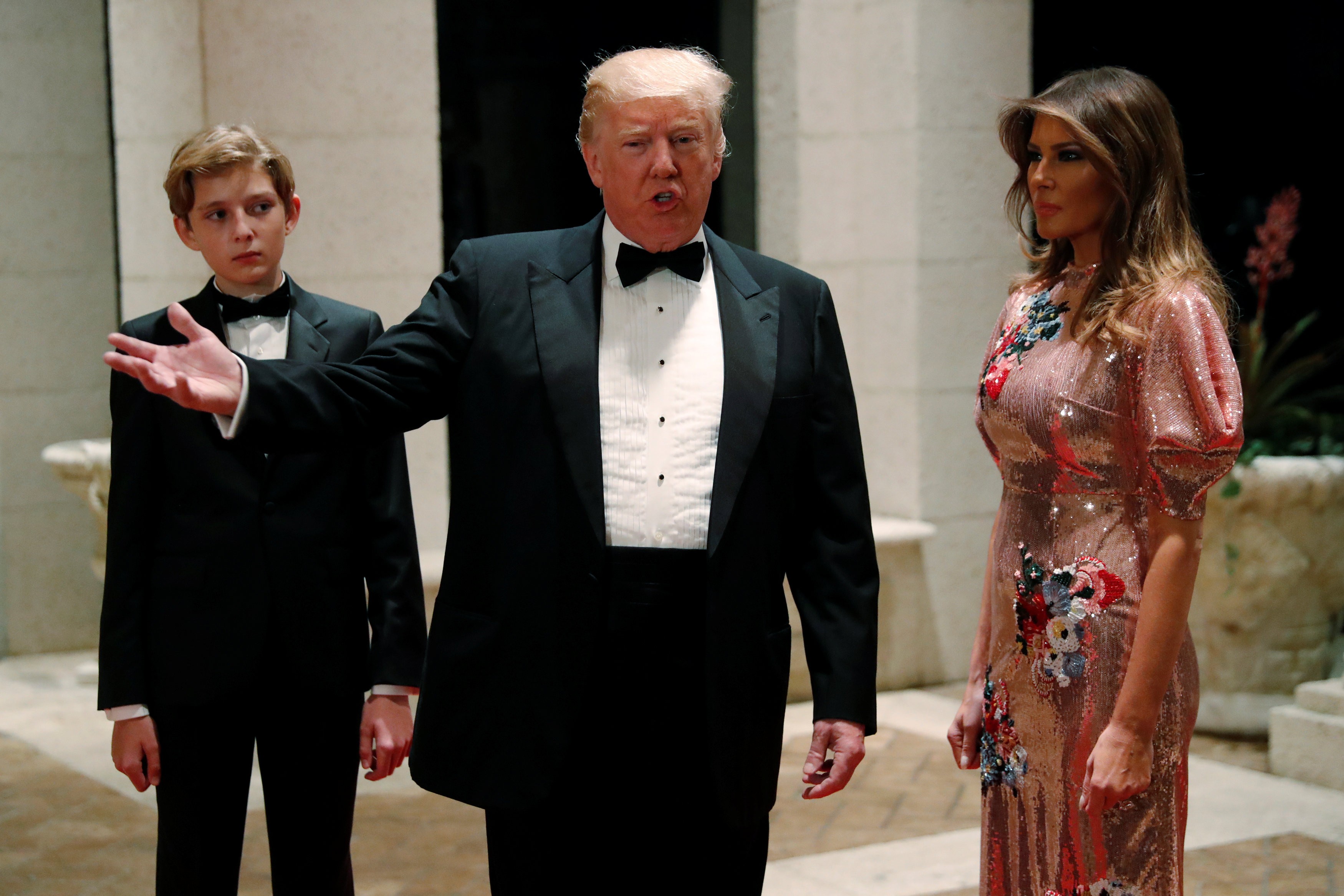 US President Donald Trump, First Lady Melania Trump and their son, Barron, arrive for a New Year’s Eve party at Trump’s Mar-a-Lago club in Palm Beach, Florida, on December 31, 2017. Photo: Reuters