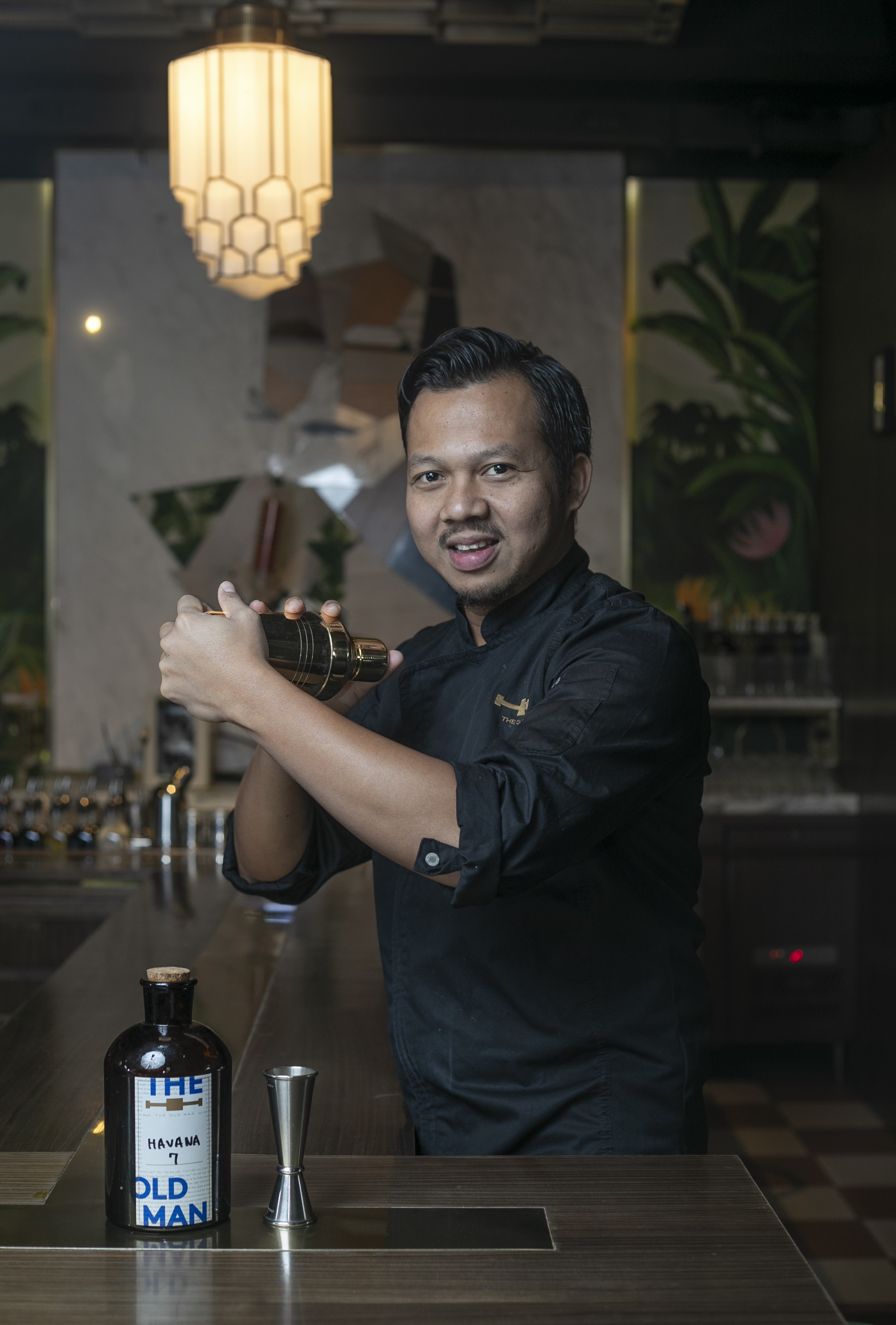 Agung Prabowo mixes a Hemingway daiquiri at The Old Man, in Central. Picture: Antony Dickson