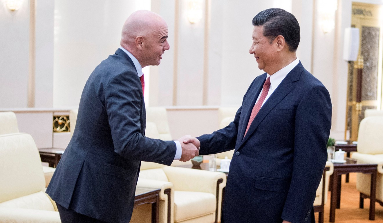 China's President Xi Jinping (R) meets Infantino in Beijing. Photo: Reuters