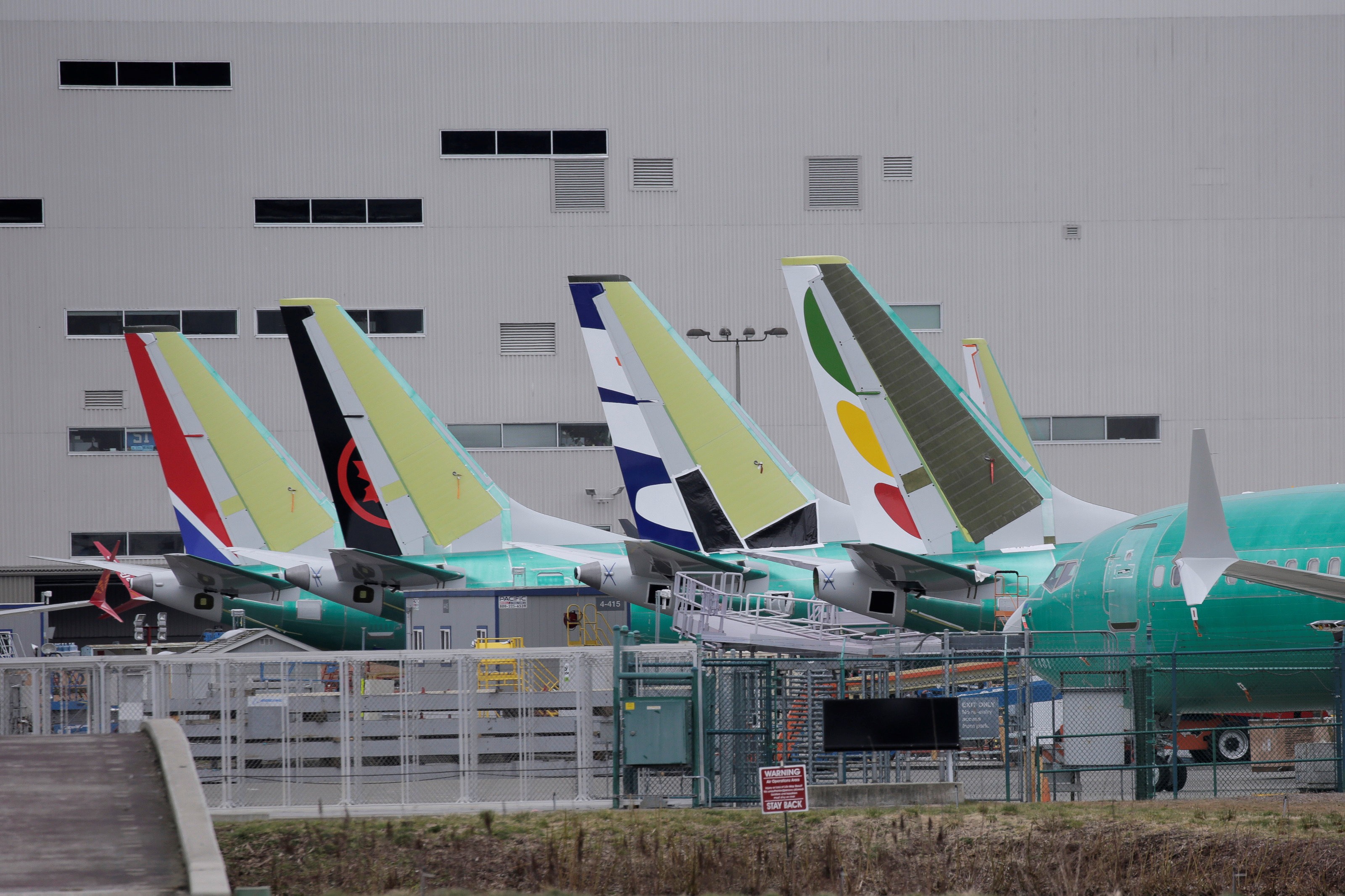 The tails of Boeing 737 MAX aircraft at a Boeing production facility in Renton, Washington. Photo: Reuters