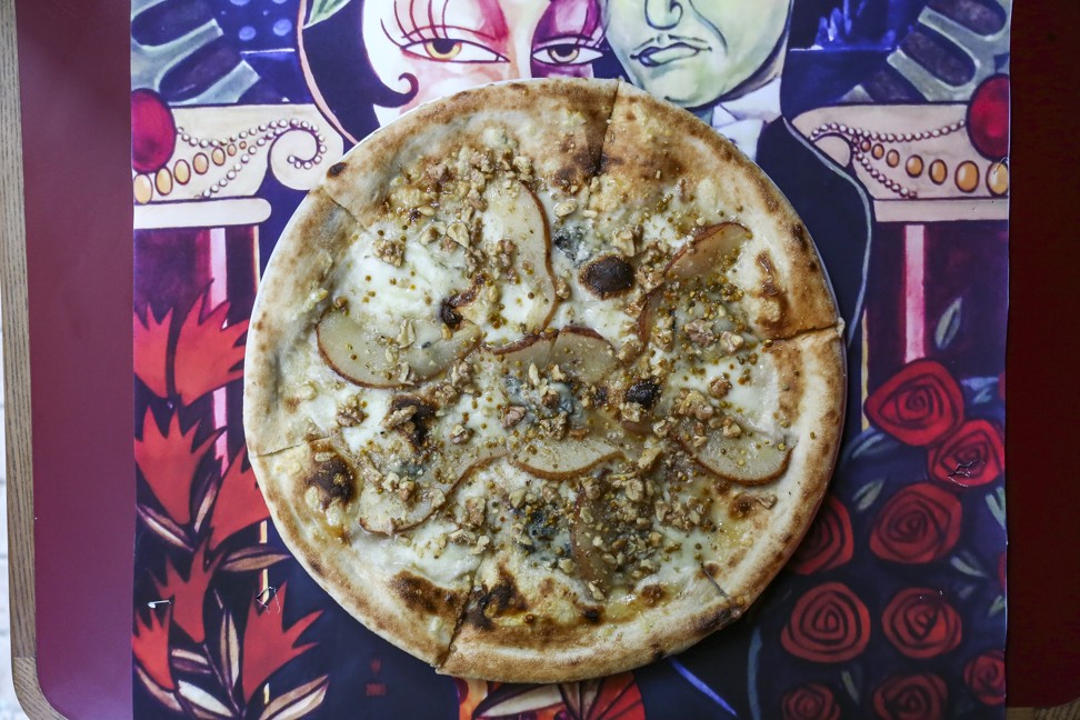 Gorgonzola with walnuts, pear and honey pizza at Homeslice. Photo: Jonathan Wong