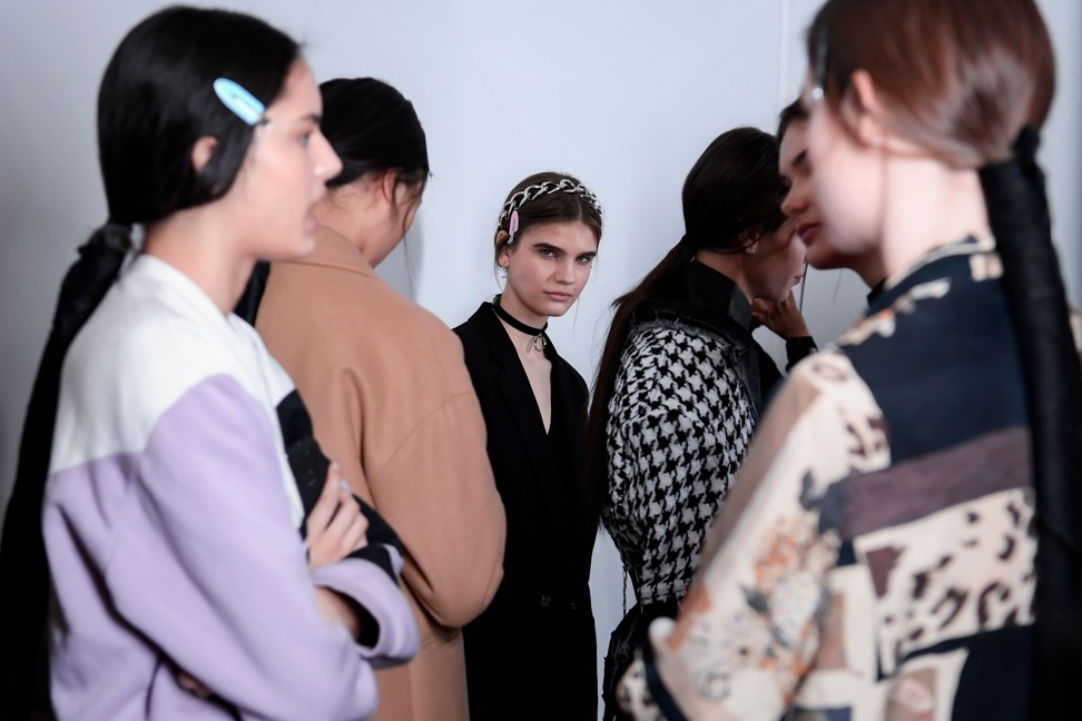 Models wait backstage as they prepare to rehearse before Balmain’s autumn/winter 2019/20 collection show at Paris Fashion Week. Photo: AFP