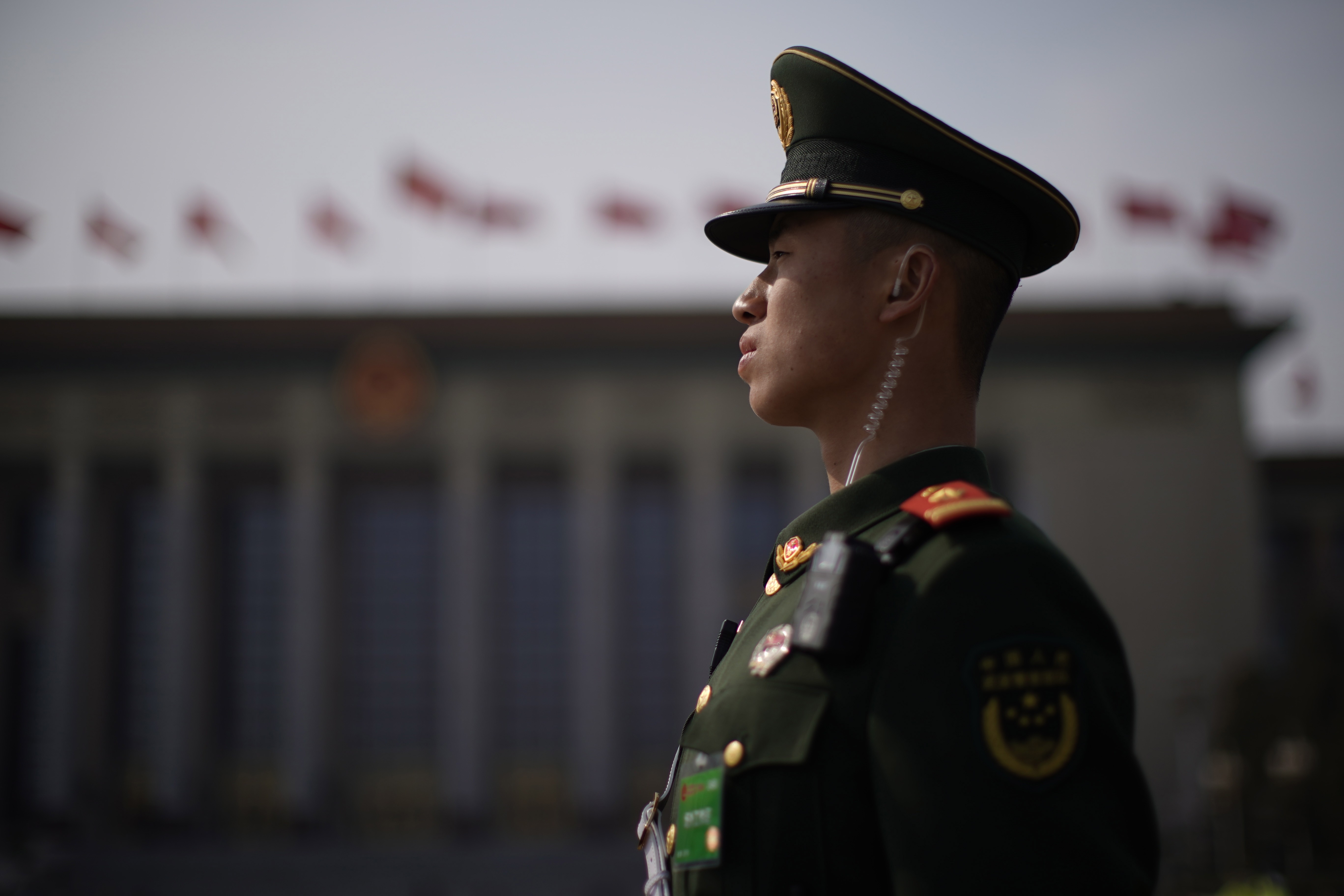 A People's Liberation Army soldier stands guard March 8 ahead of the second plenary session of the National People's Congress outside the Great Hall of the People in Beijing. Photo: EPA-EFE