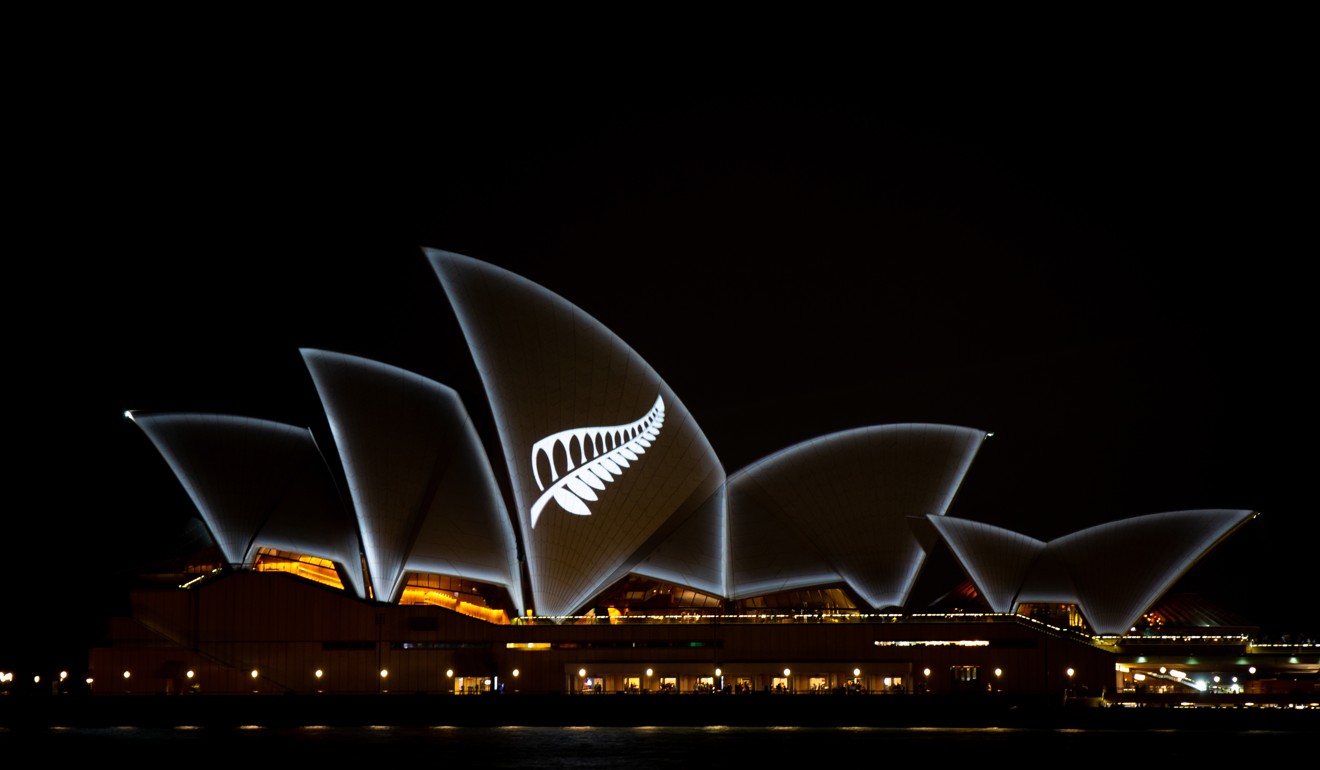 The Silver Fern of New Zealand is projected onto the sails of the Opera House in Sydney. Photo: EPA-EFE