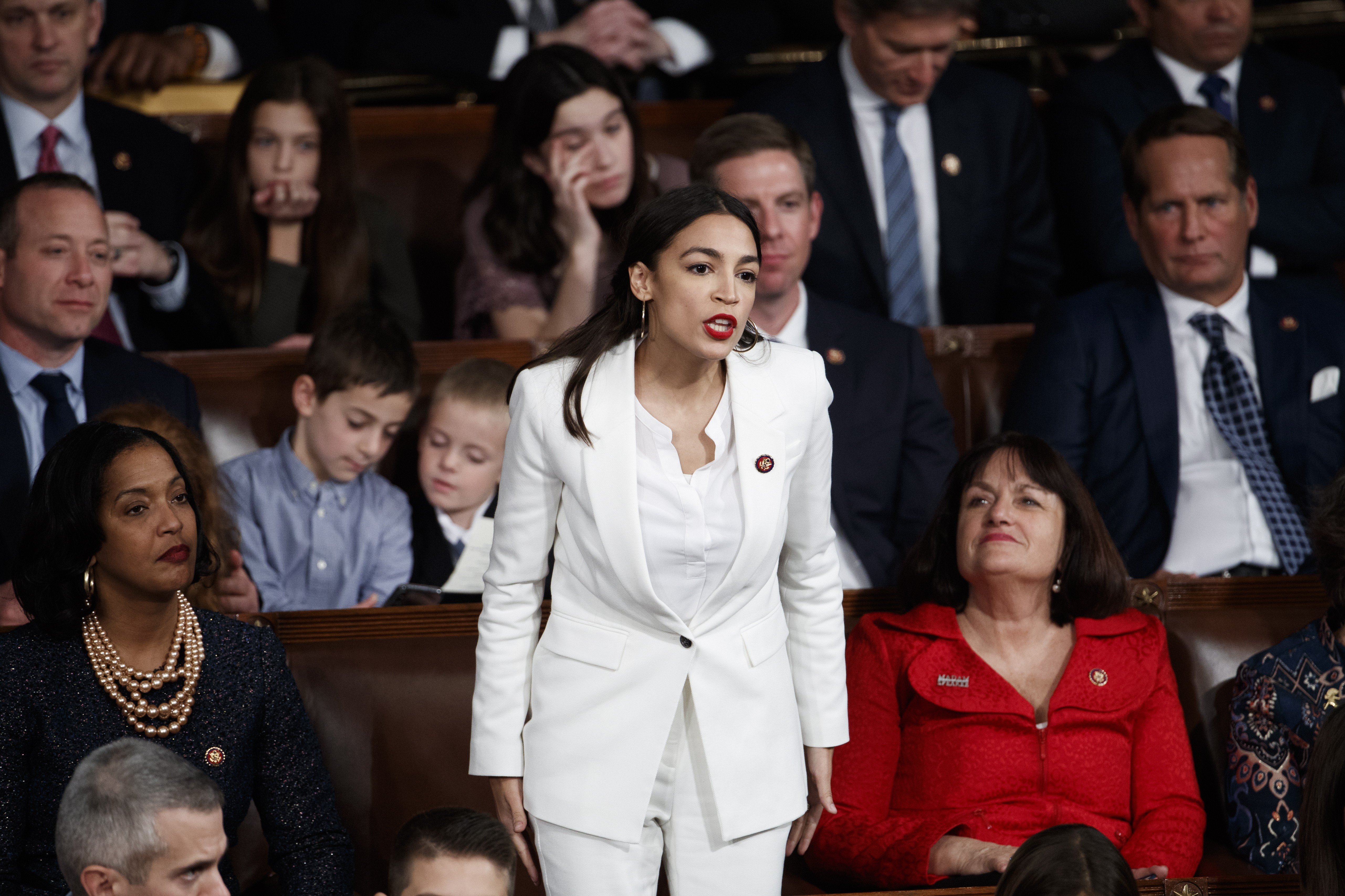 Alexandria Ocasio-Cortez, the youngest woman ever elected to US Congress, wore a white pantsuit as she cast her vote for Nancy Pelosi to be Speaker of the House, in January. Photo: EPA