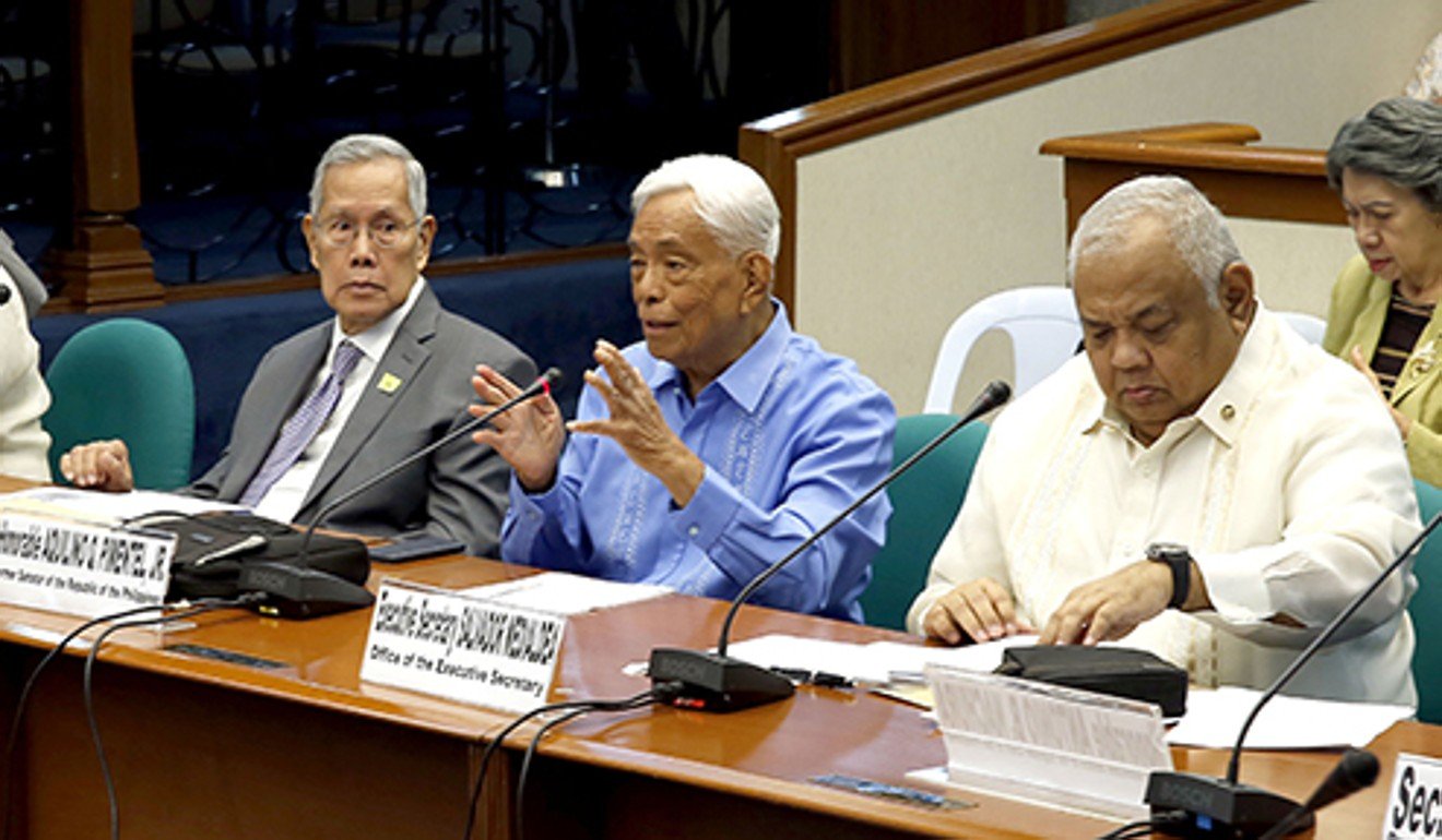 Duterte’s Executive Secretary Salvador Medialdea, right. Photo: PRIB