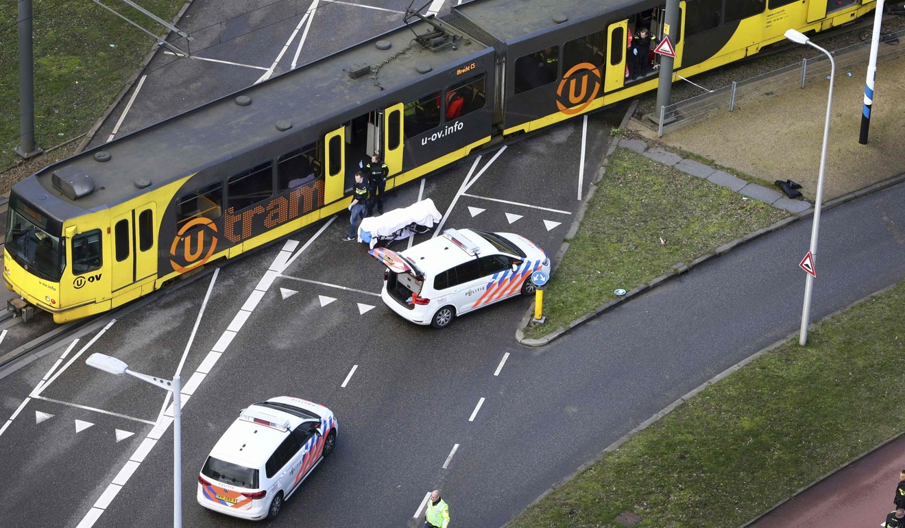 Police inspect a tram in Utrecht on Monday where a shooting took place. Photo: AFP/Ricardo Smit