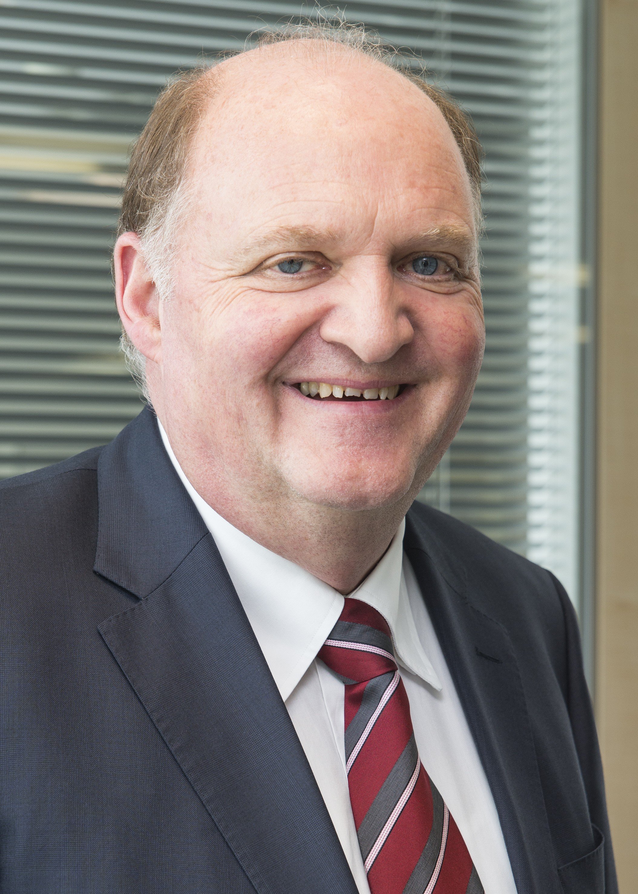 Wolfgang Grimm, CEO