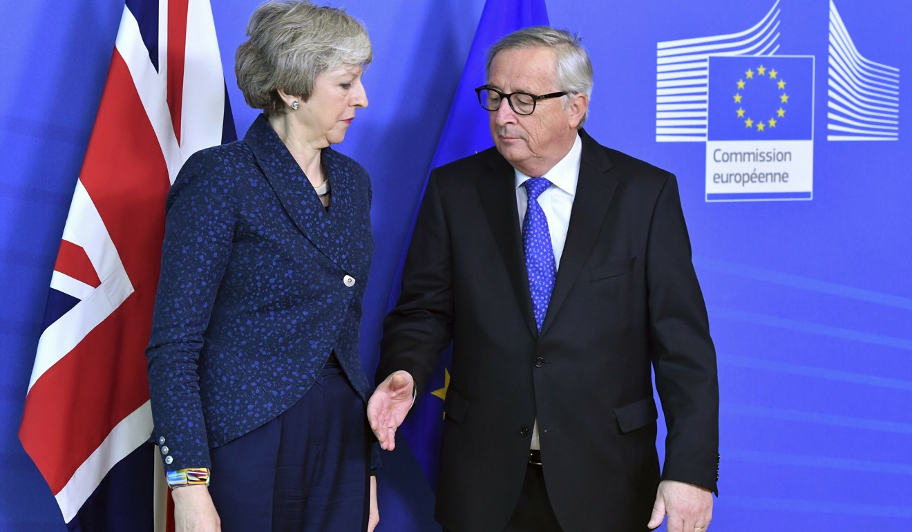 A February 2019 photo of May with European Commission President Jean-Claude Juncker at the European Commission headquarters in Brussels. Photo: AP