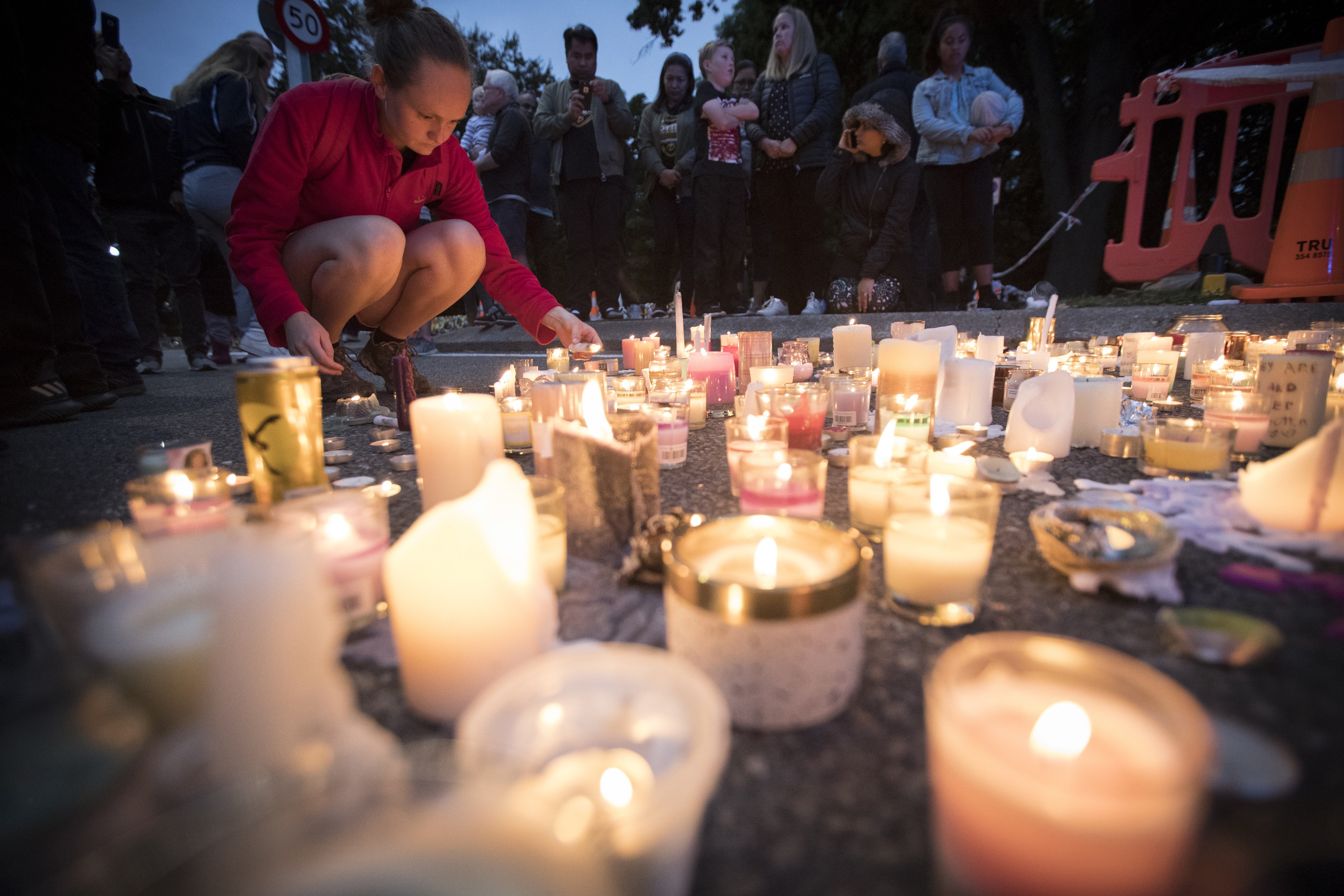 Candles are placed to commemorate victims of the terror attack outside the Al Noor Mosque in Christchurch, New Zealand. Photo: AP Photo