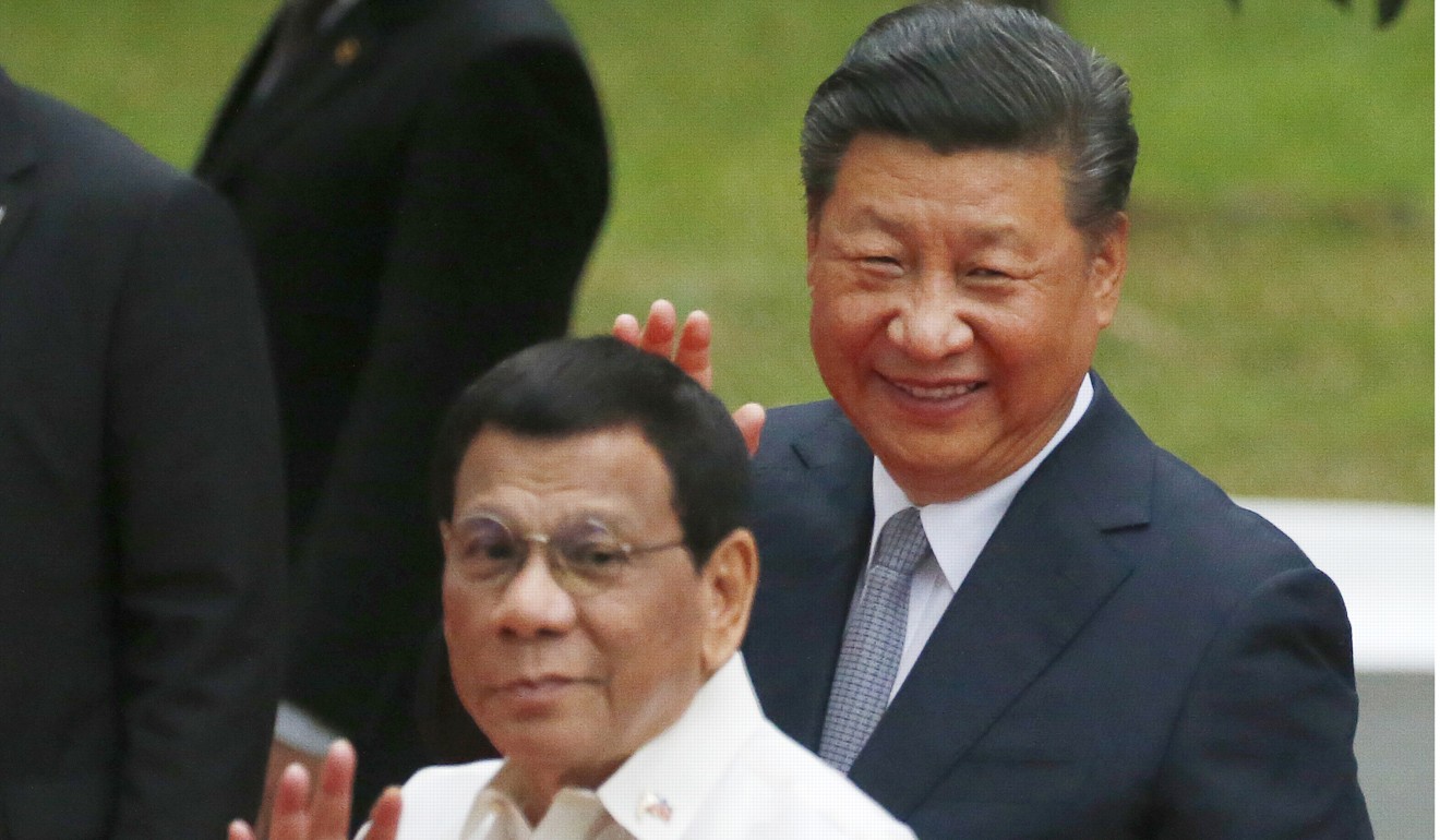 Philippine President Rodrigo Duterte with Xi in November. Photo: AP