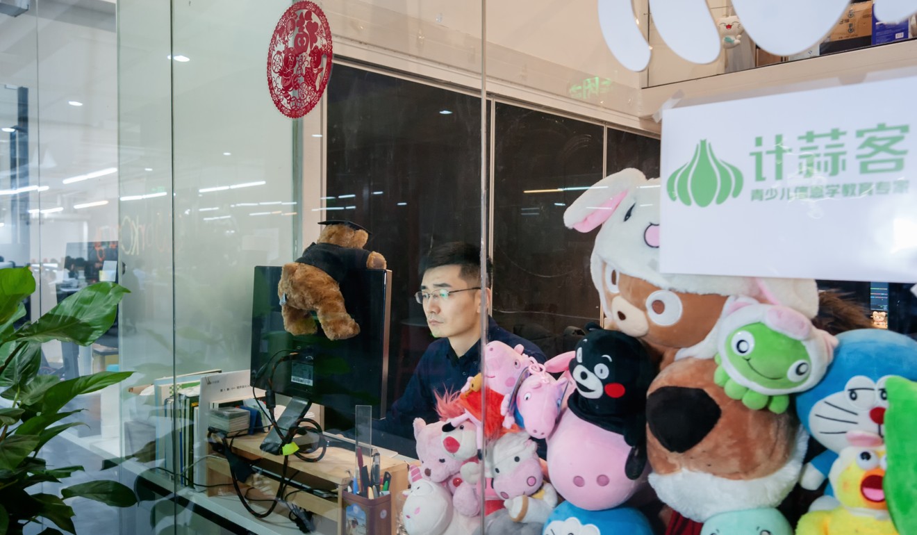 Yu Haoyan, founder of a coding education startup, works from his office in Zhongguancun. Photo: Handout