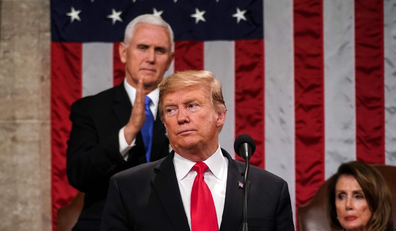 US President Donald Trump with Vice-President Mike Pence in the background. Photo: AFP