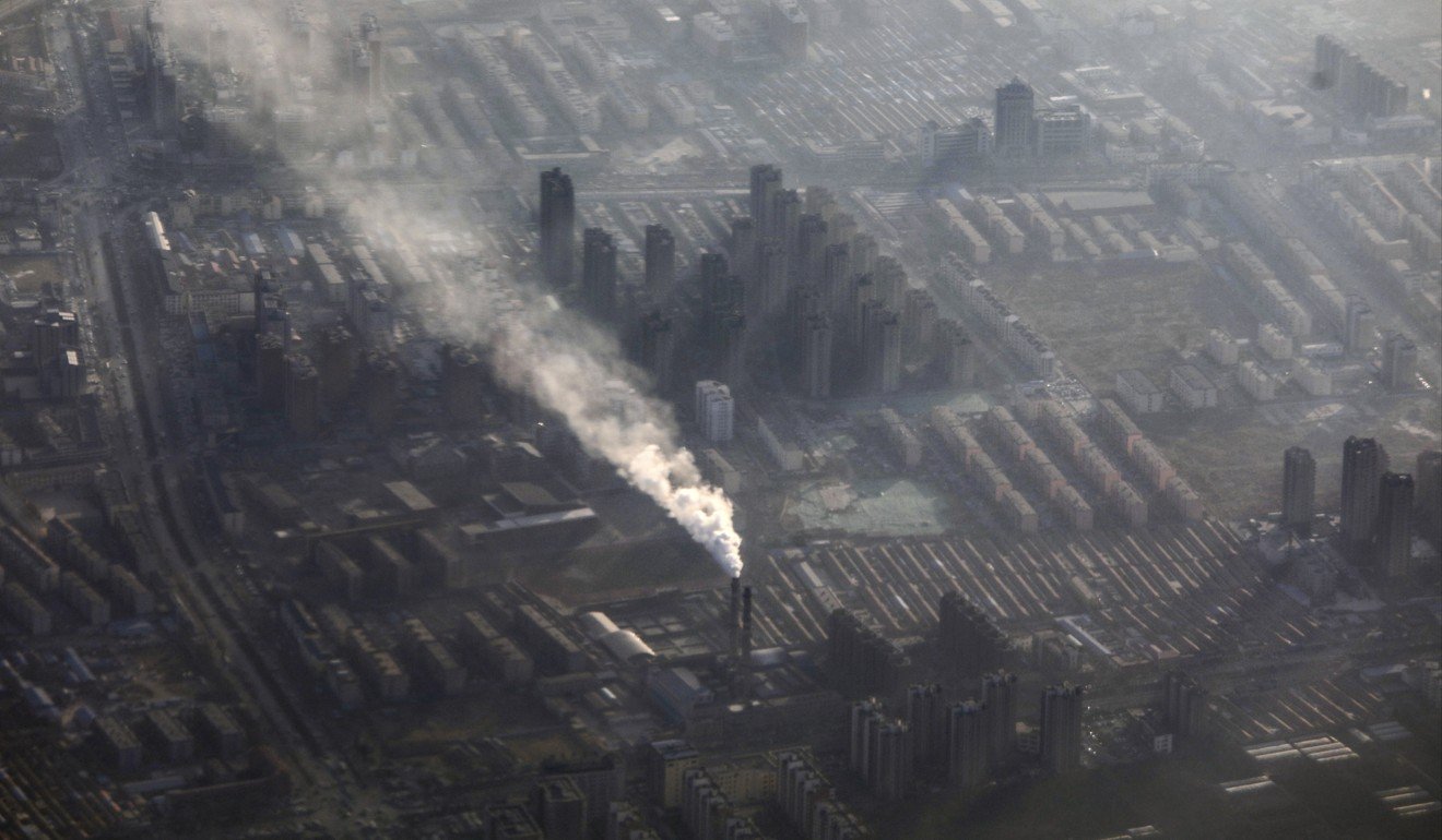 Smoke rises from chimneys near residential areas in China’s Hebei province on January 16. Photo: Simon Song