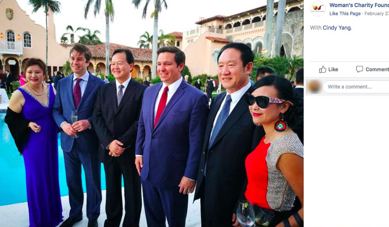Future Florida governor Ron DeSantis (centre) and Cindy Yang (left) attend an event at Trump’s Mar-a-Lago resort in 2018. Photo: TNS