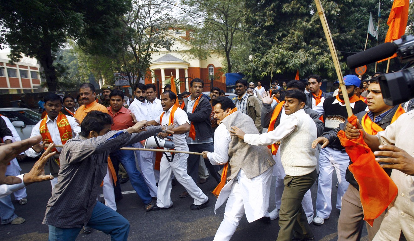Indian Hindu and Muslim activists clash in New Delhi on an anniversary of the razing of The Babri Mosque in Ayodhya. Photo: AFP