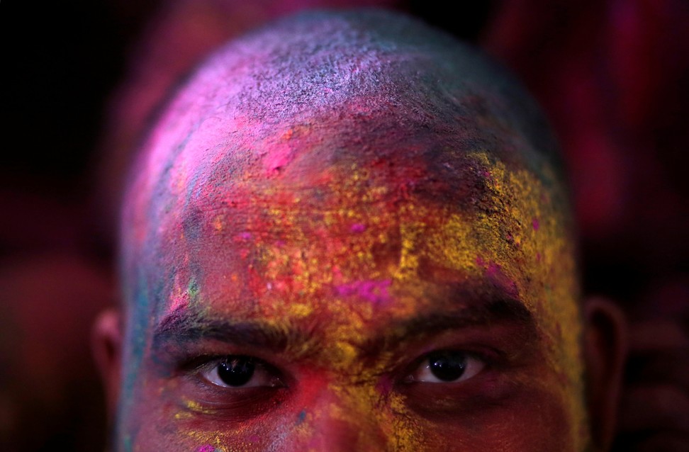 Four main colours of powder are used during Holi to represent different things, such as healing, new beginnings and Krishna. Photo: Reuters