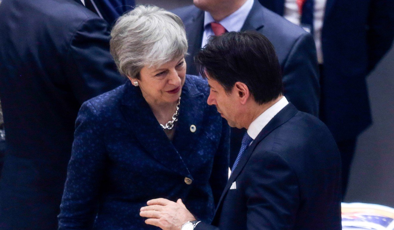 Britain’s Prime Minister Theresa May and Italian Prime Minister Giuseppe Conte during round table at the European Council in Brussels. Photo: EPA-EFE
