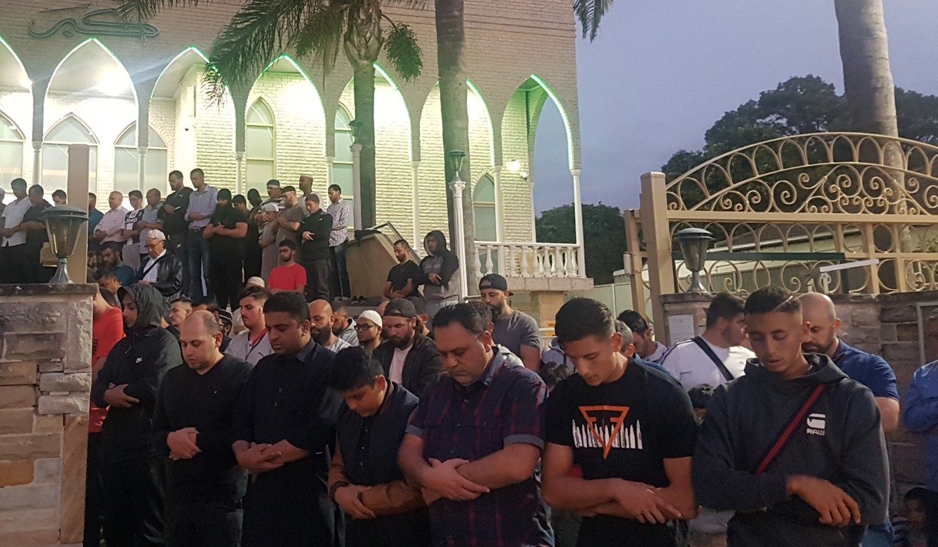 Worshippers pray for victims of the Christchurch shootings during a vigil in Australia. Photo: AP