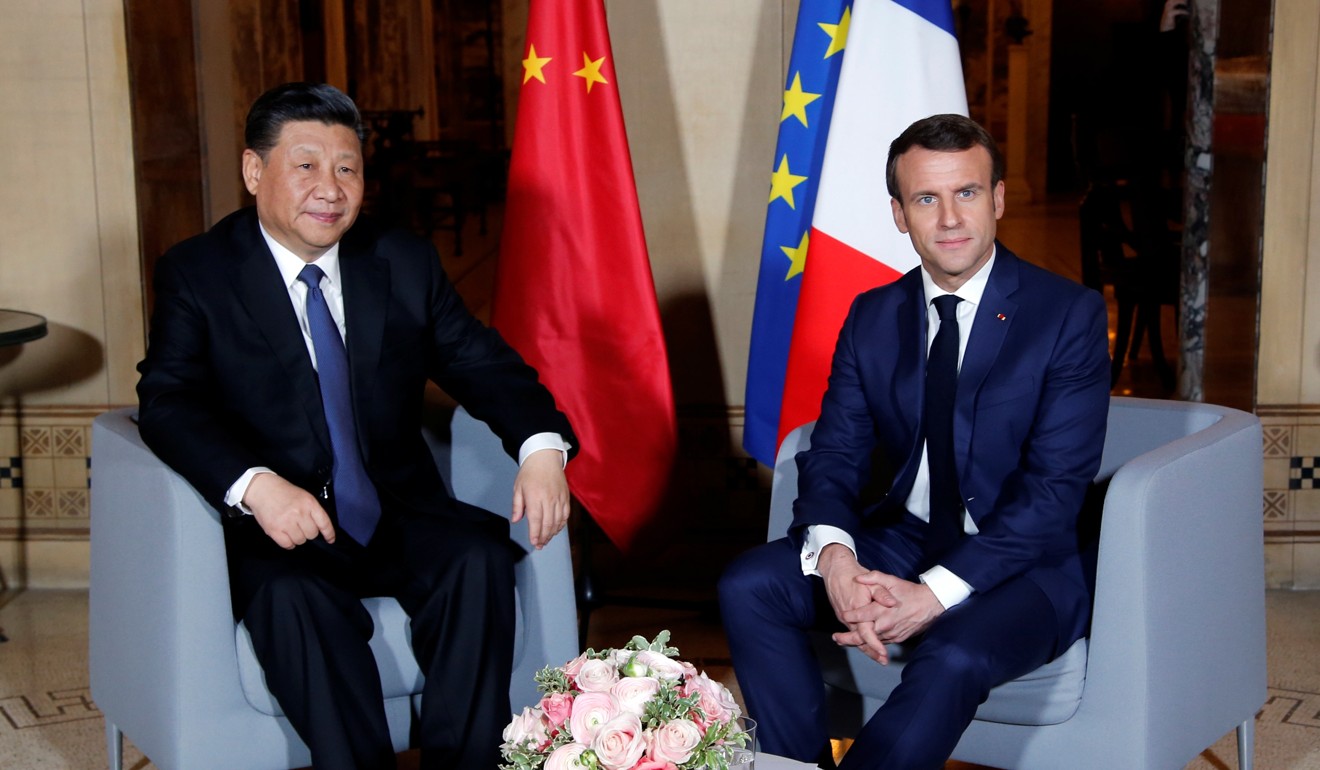 Xi and Macron before their dinner on Sunday. Xi officially begins a three-day state visiti on Monday. Photo: EPA-EFE