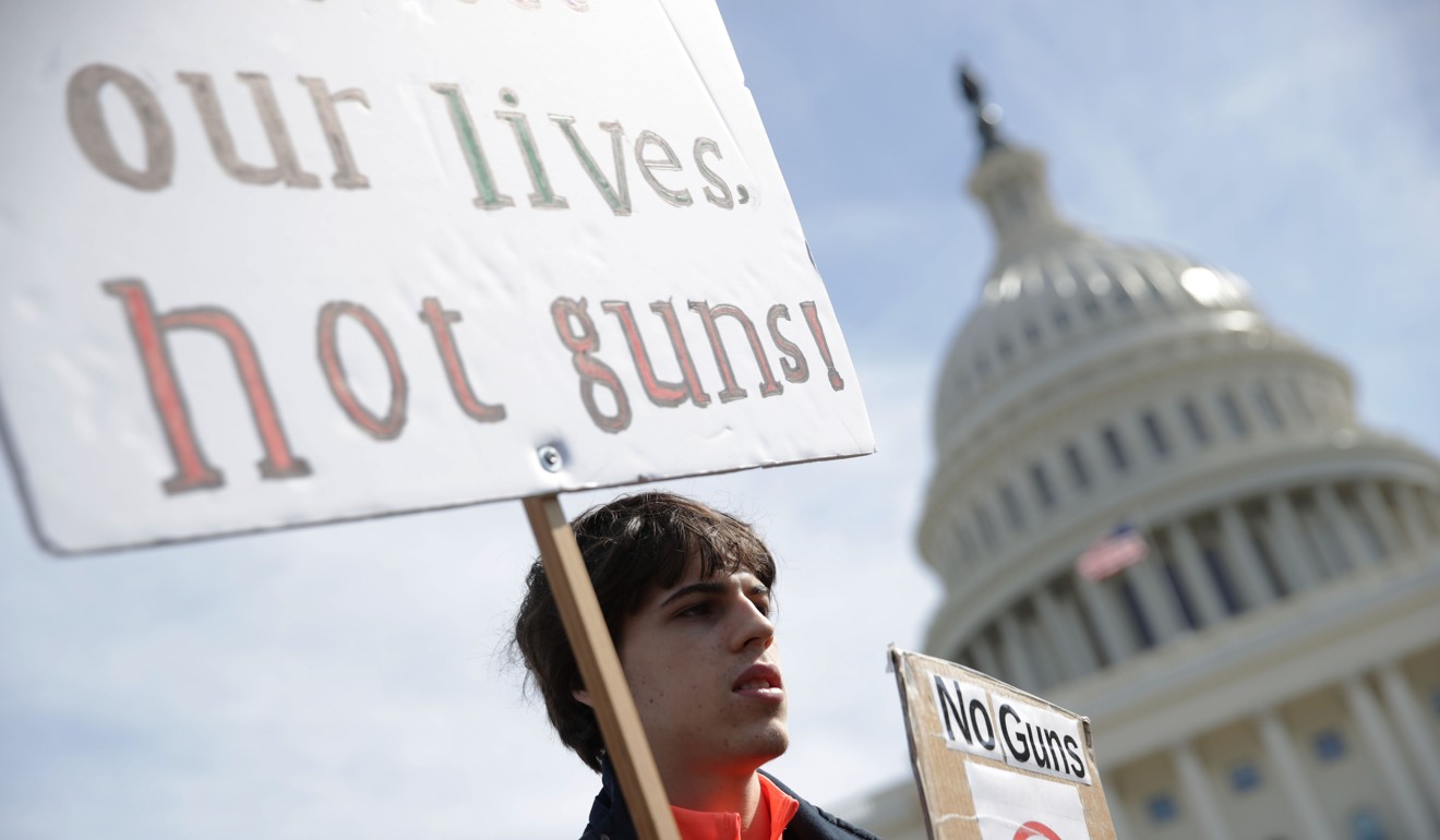 Student Maximilian Steubl of Churchill High School in Potomac, Maryland, participates in a gun control rally at the West Front of the US Capitol in Washington, DC. Photo: AFP