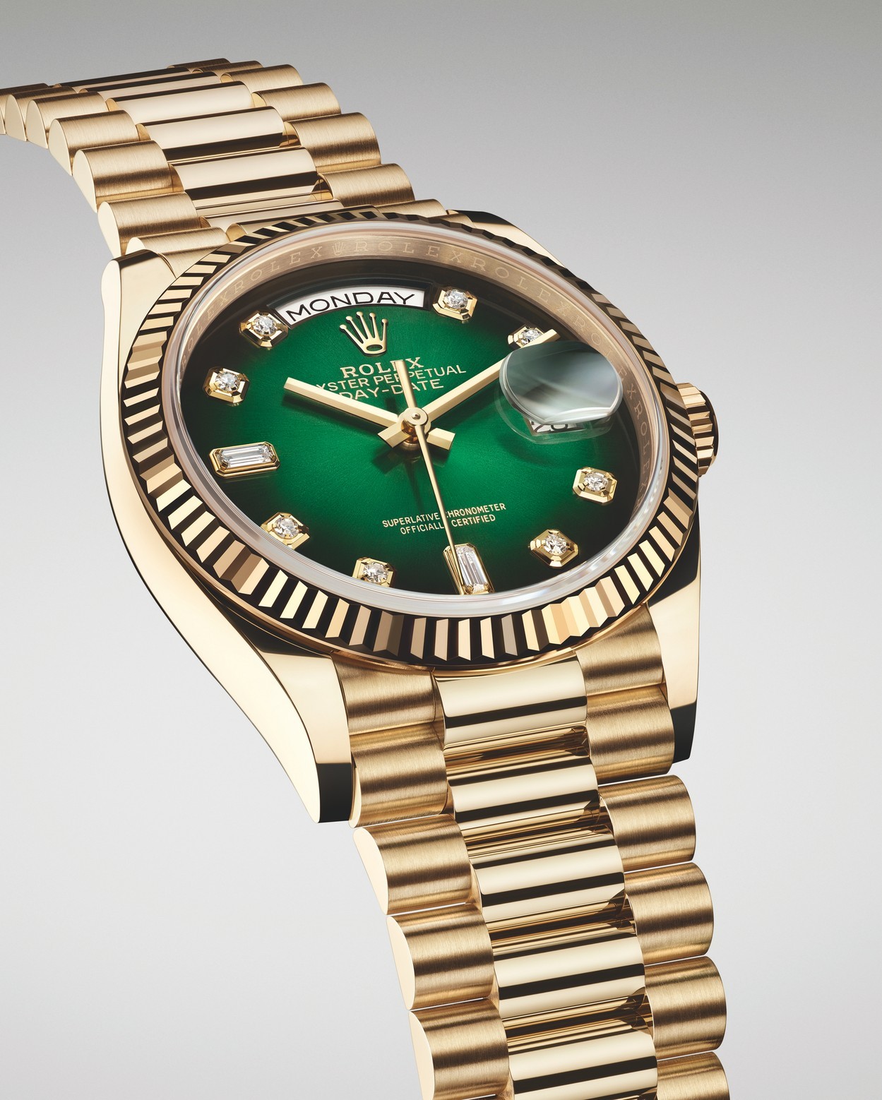 Rolex’s new Day-Date 36 has a green ombre sunray dial.