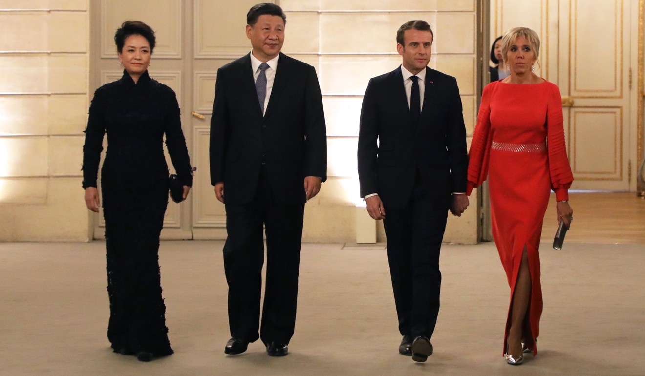 Xi Jinping and his wife Peng Liyuan arrive with Emmanuel Macron and his wife Brigitte Macron for a state dinner at the Elysee Palace on Monday. Photo: EPA-EFE