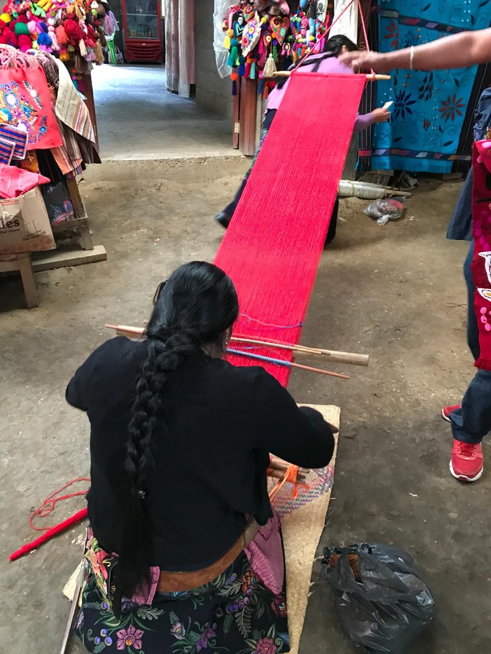 An artisan works on a loom in Chiapas, Mexico, where Mika Rouge sources traditional, handmade Mexican clothes and accessories.