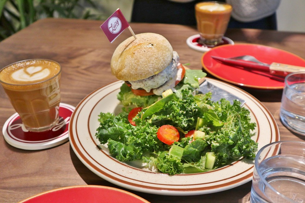 Lucy Coffee & Food’s Lucy’s Veggie Burger features a quinoa patty, with a generous helping of salad