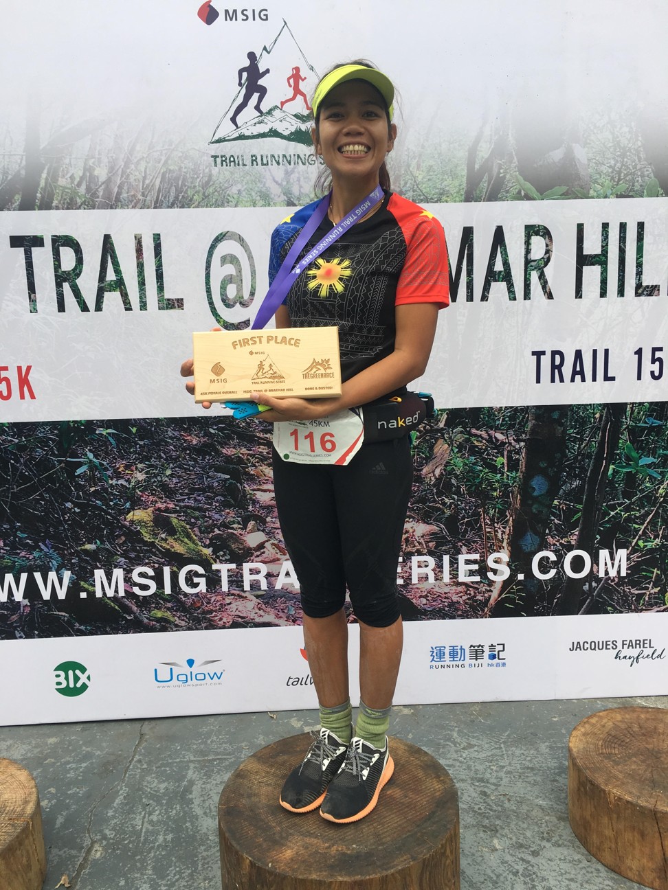 Fredelyn Alberto, a fellow domestic helper, wins the Breamar 45km trail race. Photo: Ben Young