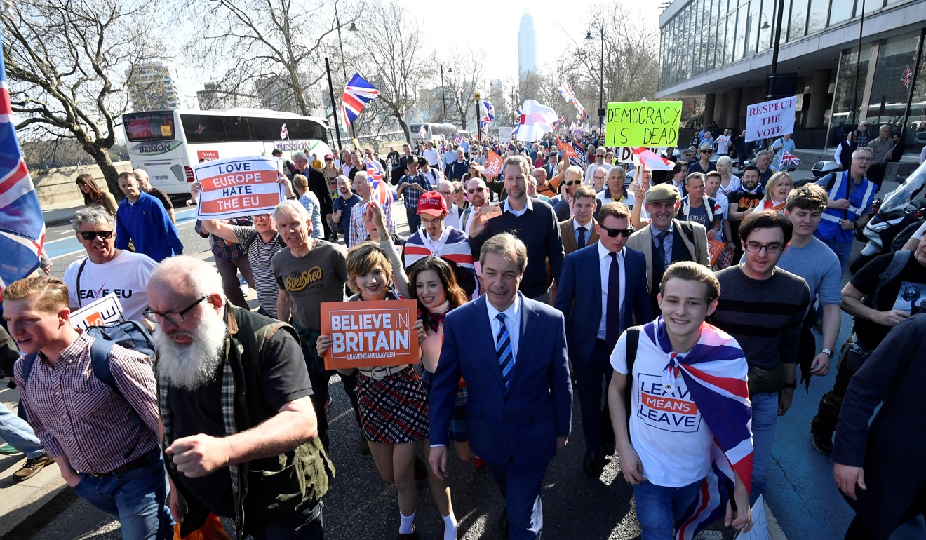 Nigel Farage walks at the March to Leave demonstration in London. Photo: Reuters