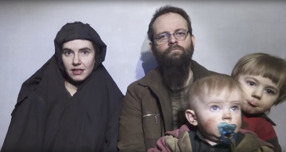 Caitlan Coleman and husband Joshua Boyle with two of their children, in a scene from a hostage video released by Taliban media in 2016. Photo: AP