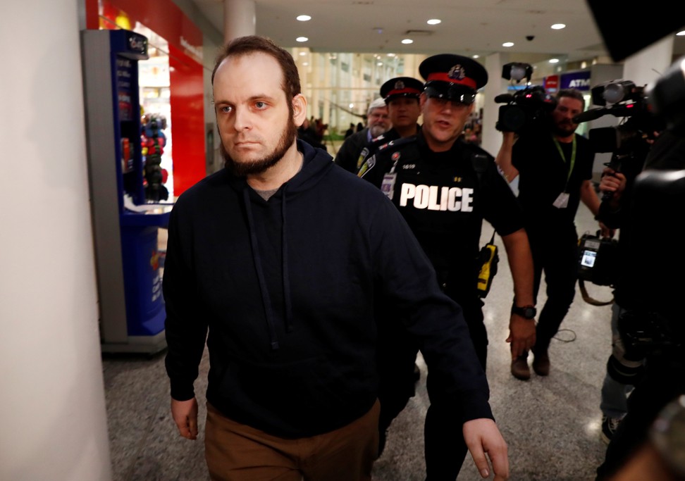 Joshua Boyle walks through Toronto’s Pearson airport after arriving back in Canada on October 13, 2017, nearly five years after he and his wife were abducted in Afghanistan. Photo: Reuters