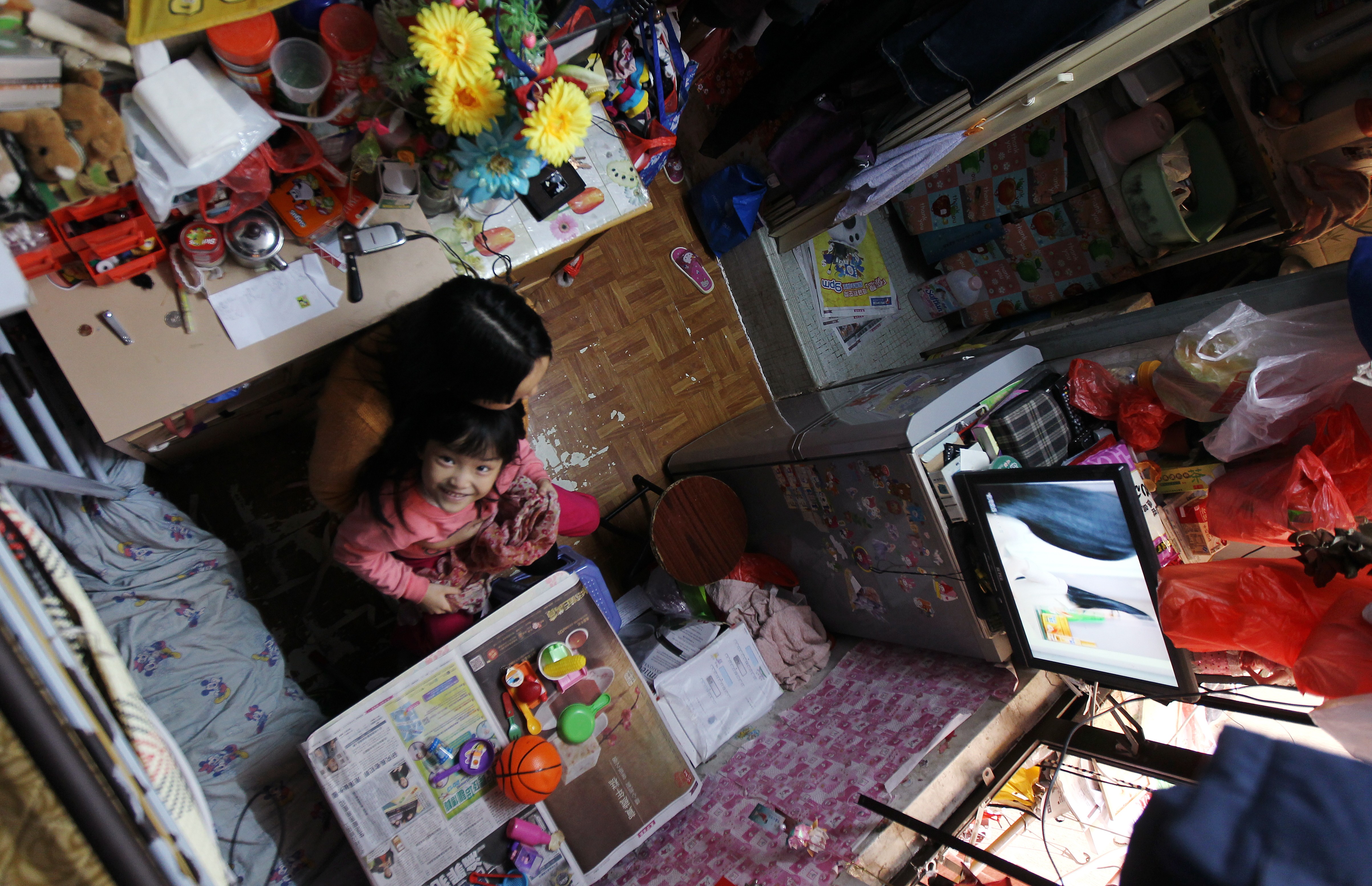 In a child’s eyes, life in a subdivided flat is not necessarily miserable. Photo: K.Y. Cheng