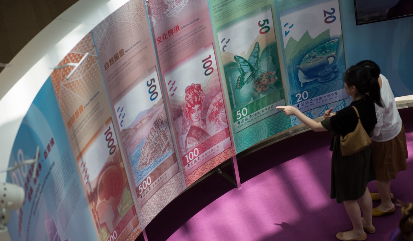 An exhibition of new Hong Kong dollar banknotes. Higher salaries are a key reason drawing many Malaysian expatriates to Hong Kong. Photo: EPA