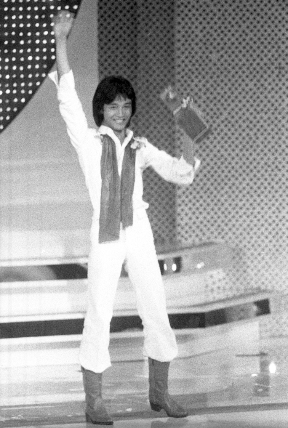 Leslie Cheung holds his trophy as winner of the Asian Amateur Singing Contest in May 1977. Photo: SCMP