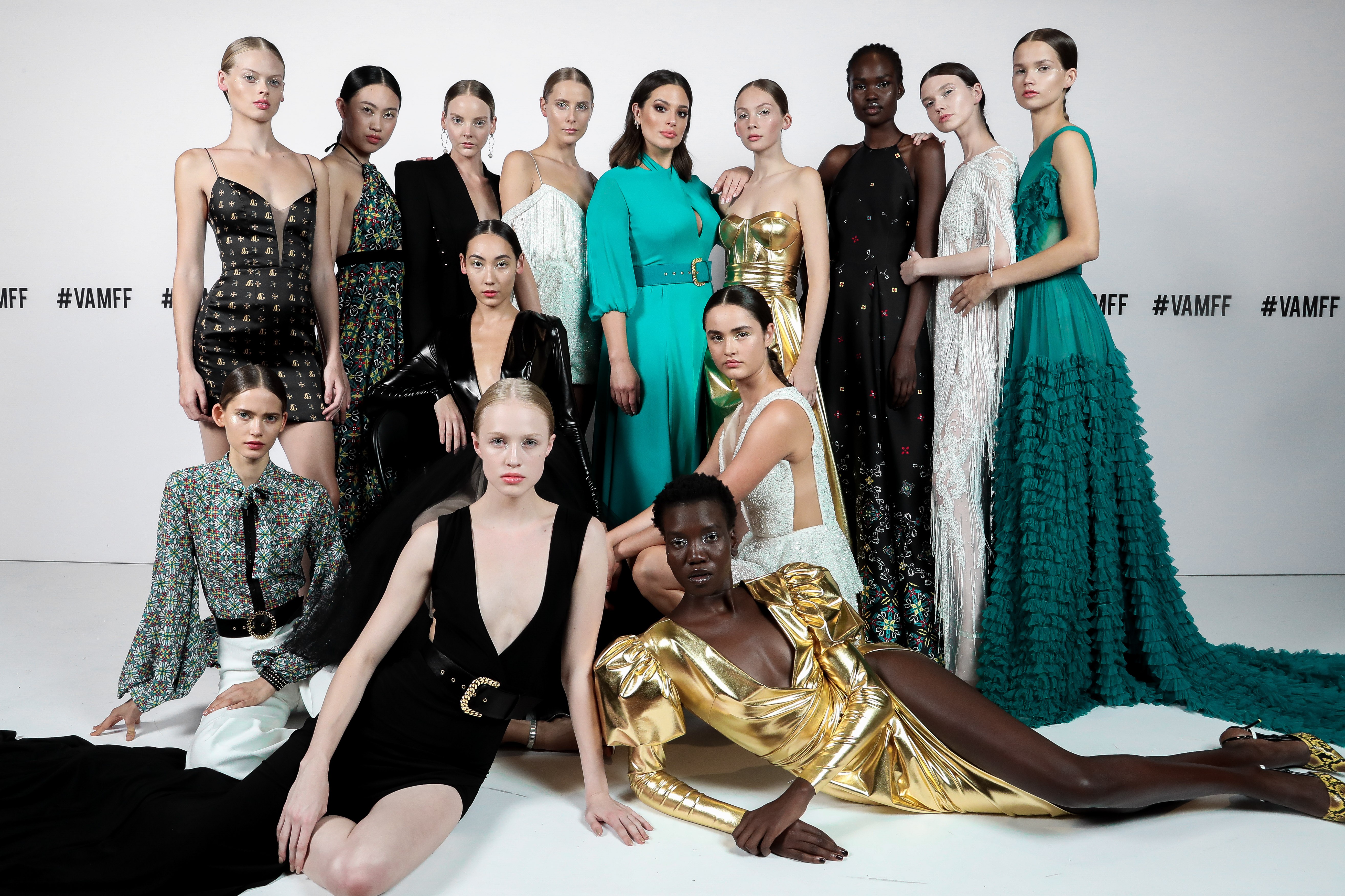 Models, including Ashley Graham (centre in aqua green dress), at the recent Virgin Australia Melbourne Fashion Festival.